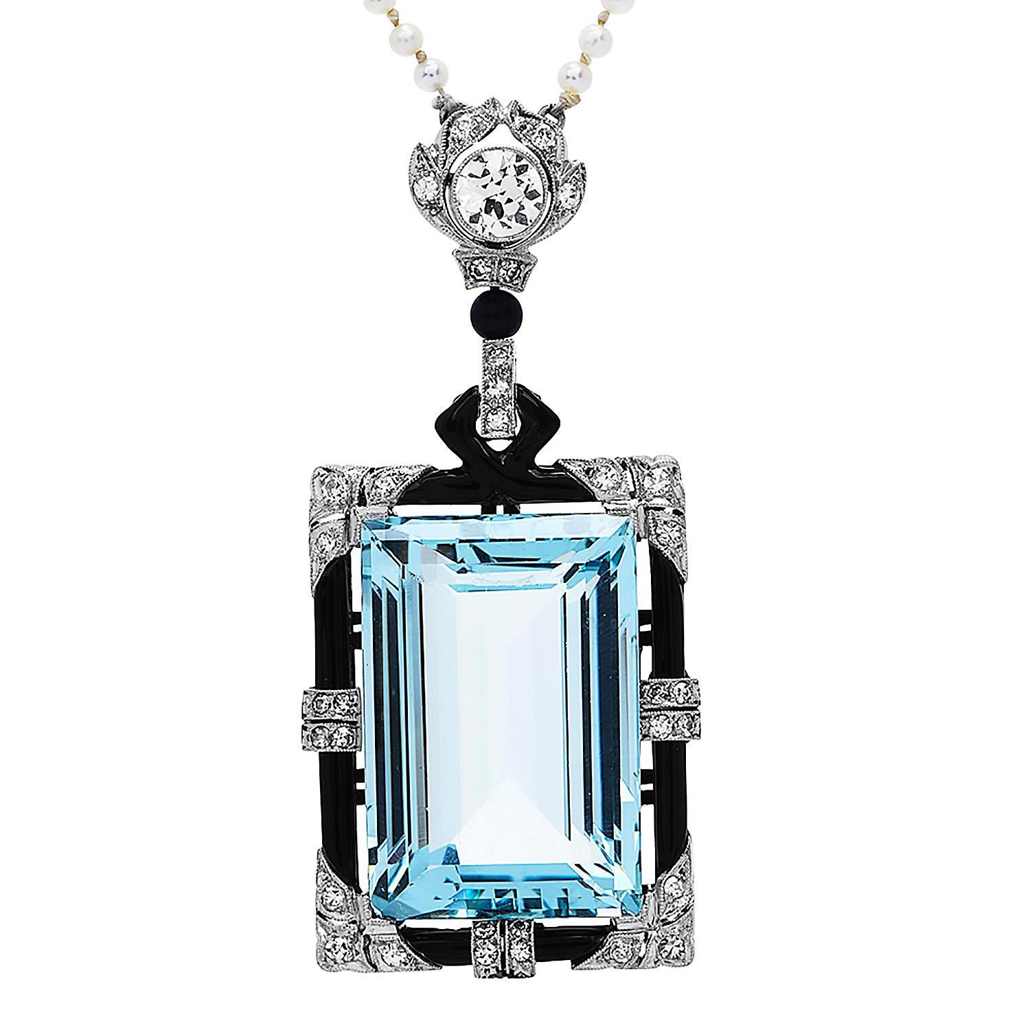An antique deco piece with endless beauty, a color play with elegance between the sky blue color Aquamarine & the black from the Onyx gemstones. 

 this piece is formed by 2 mm cream tone Seed pearls, expertly knotted in between, with natural