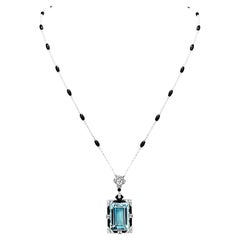 Collana con ciondolo in oro con diamanti e perle di onice in stile Deco antico