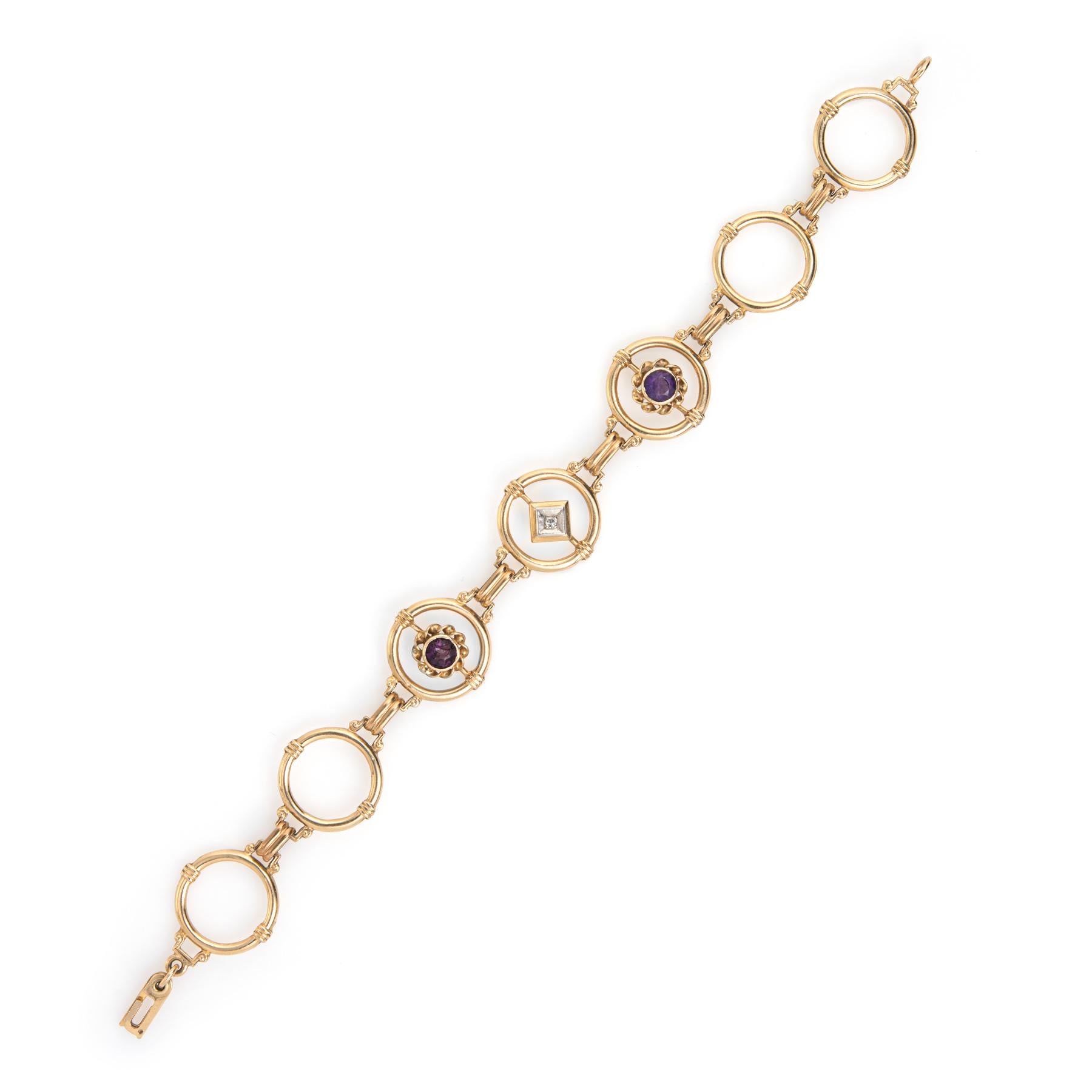 Stylish and elegant vintage Art Deco era bracelet (circa 1920s to 1930s), crafted in 10 karat yellow gold. 

Two amethysts are estimated at 0.20 carats each, accented with an estimated 0.01 carat single cut diamond. Note: chip to one amethyst