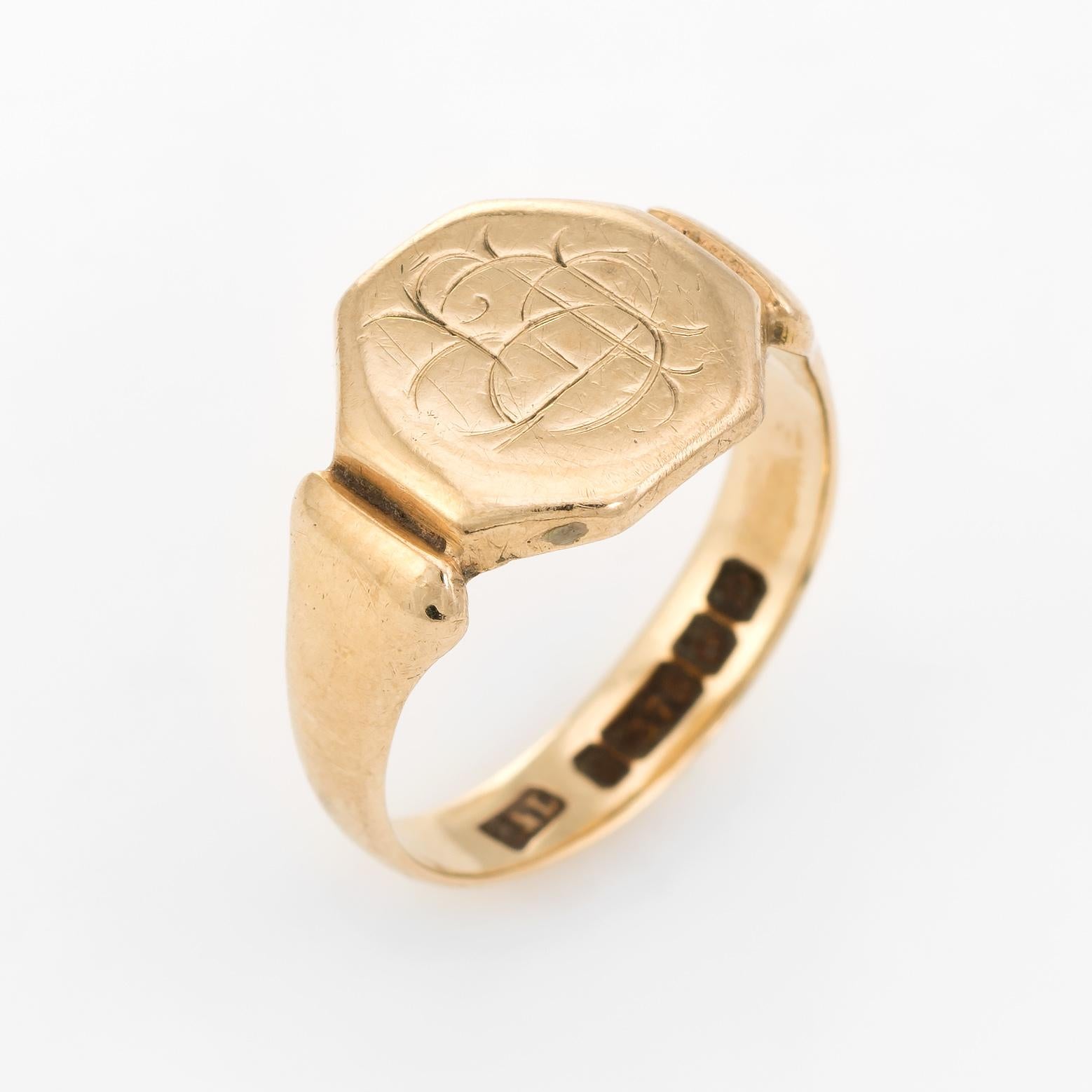 Finely detailed vintage Art Deco era (circa 1928) signet ring, crafted in 9 karat yellow gold. 

The hexagonal signet mount is inscribed with several initials though due to wear we are unable to decipher the letters. 

The ring was sourced on our