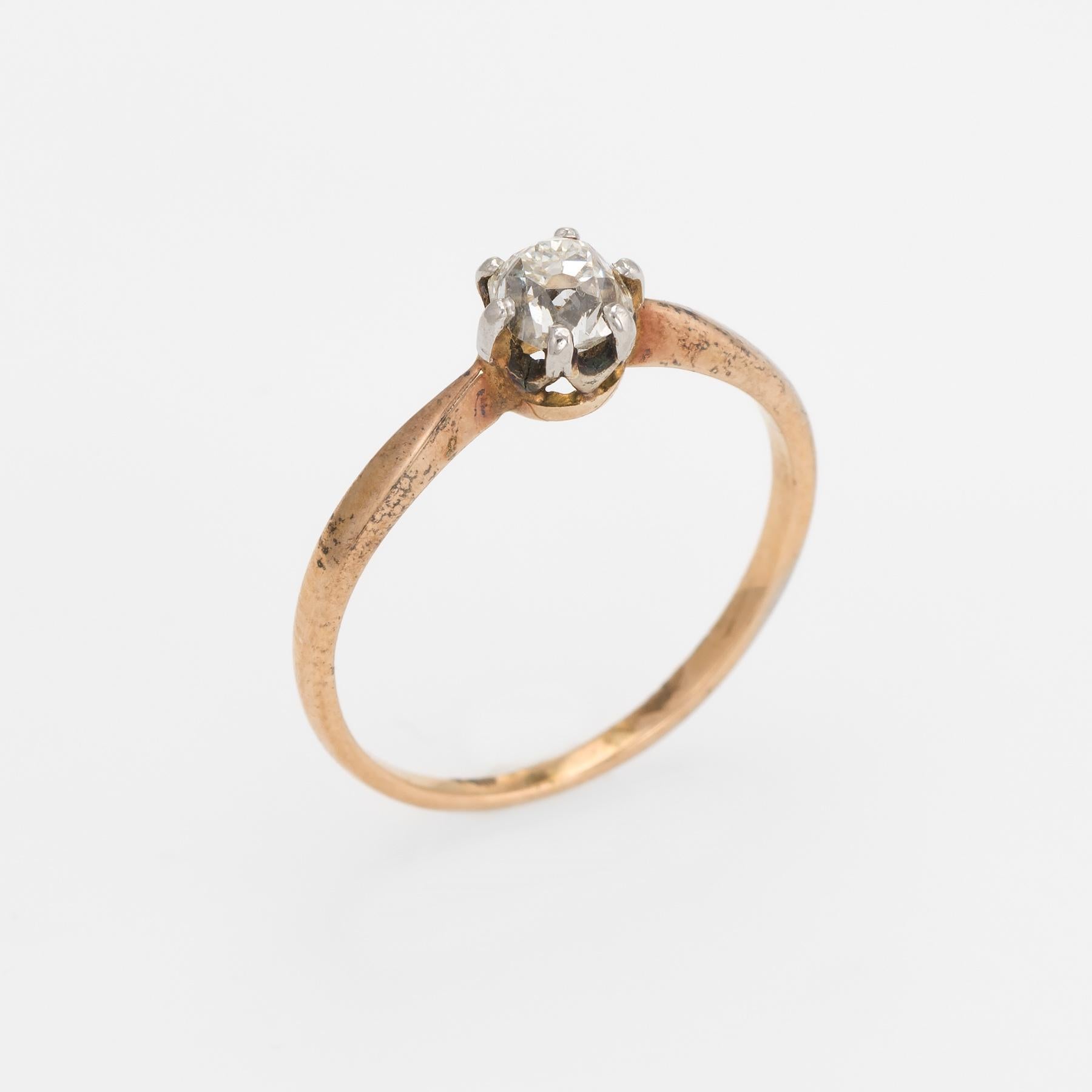 Elegant & finely detailed Art Deco era ring (circa 1920s to 1930s), crafted in 14 karat yellow gold. 

Centrally mounted estimated 0.25 carat Old Mine cut diamond (estimated at J-K color and SI2 clarity).   

The ring epitomizes vintage charm and