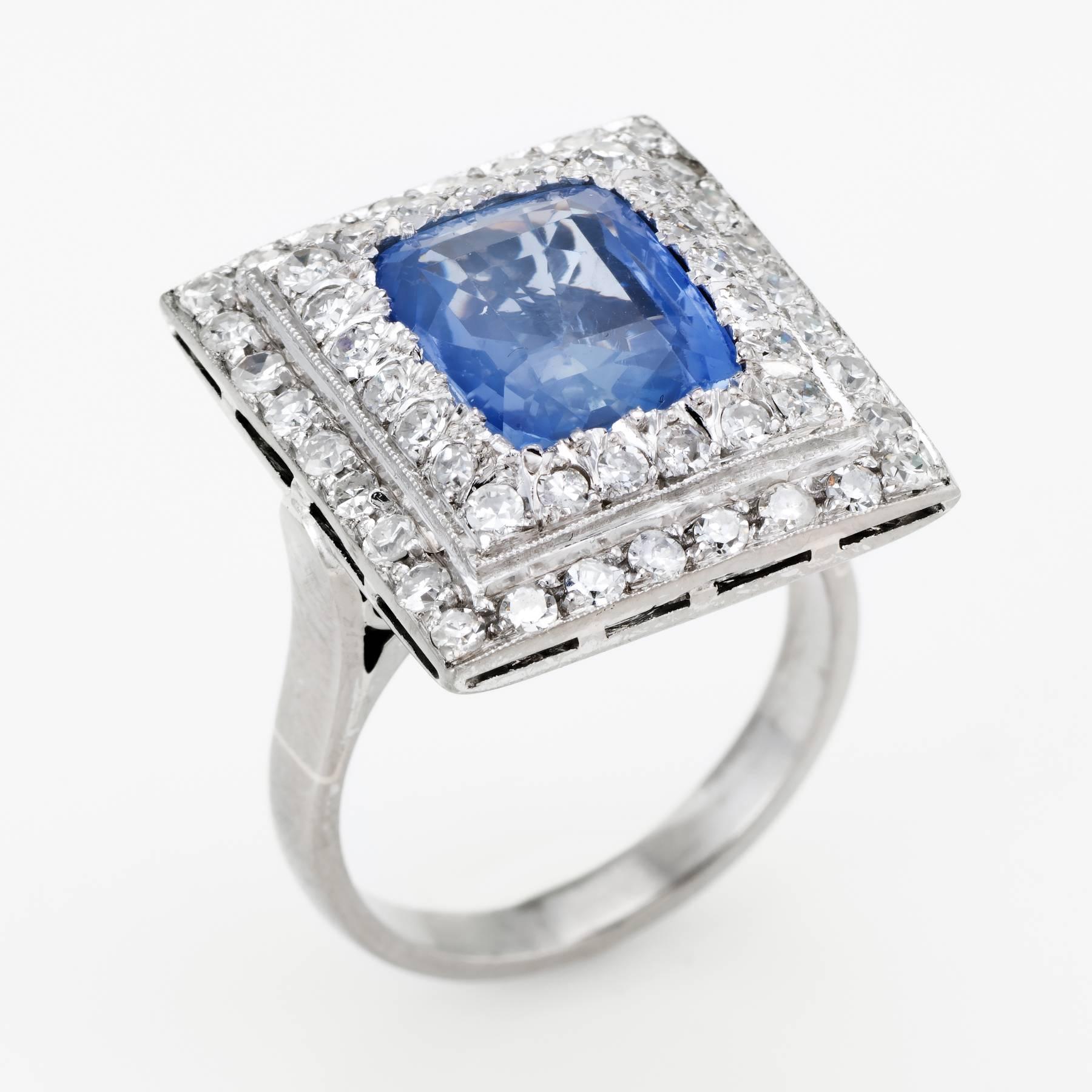 Finely detailed vintage Art Deco era ring (circa 1920s to 1930s), crafted in 18 karat white gold. 

Centrally mounted rectangular cushion cut Ceylon blue sapphire measures approx. 10.8 x 8.7 x 5.1mm (estimated at 4.80 carats - by formula). The