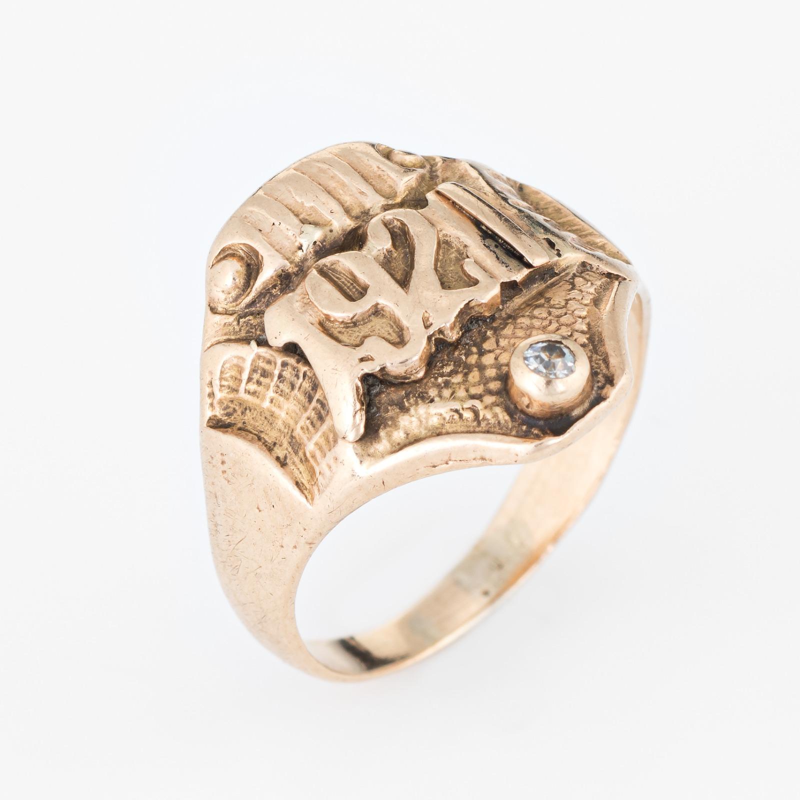 Lovely antique Art Deco signet ring (circa 1921), crafted in 14 karat yellow gold. 

One estimated 0.03 carat old mine cut diamond is set into the mount (estimated at H-I color and I1 clarity). 

Officially an antique ring this year at 100 years