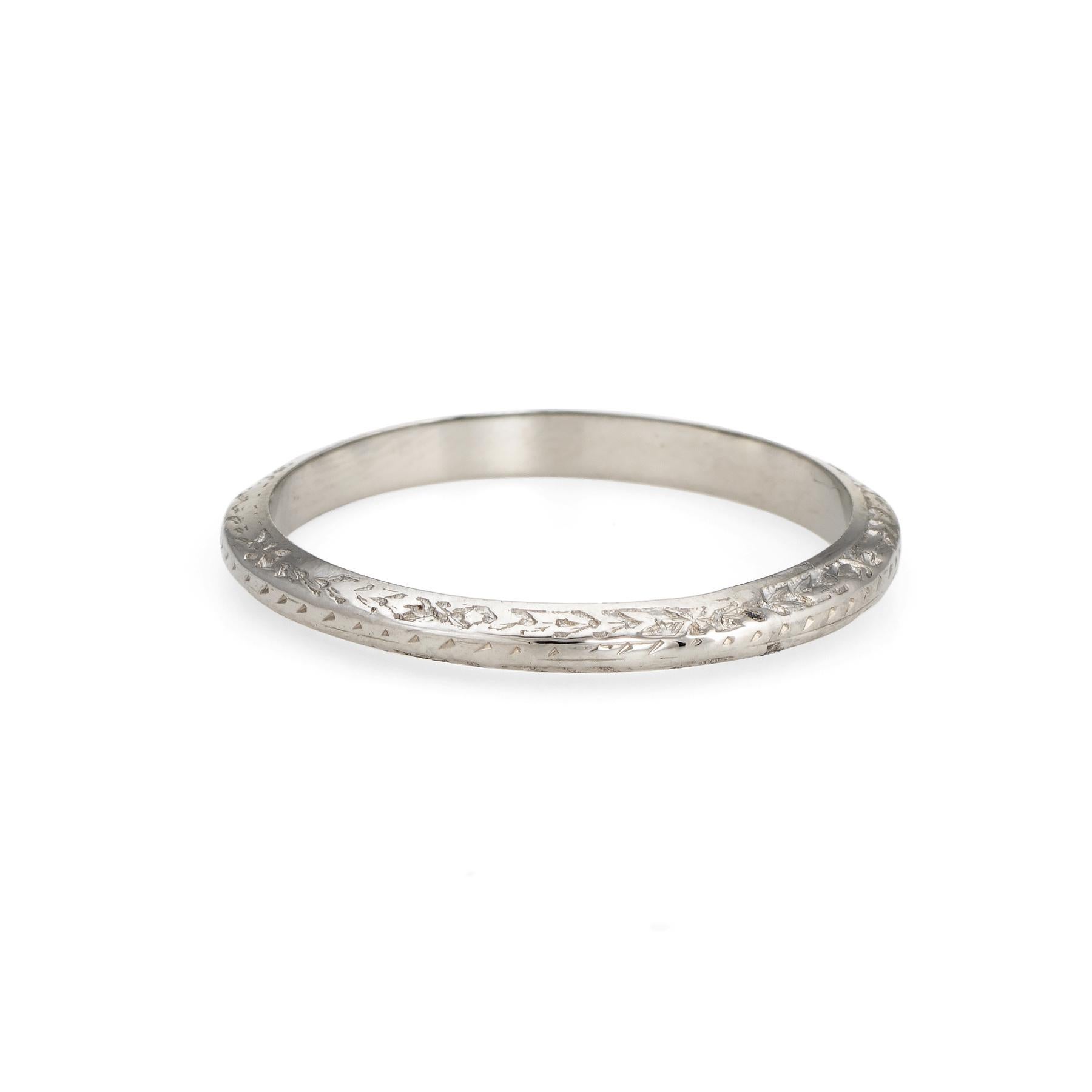 Finely detailed vintage Art Deco era band (circa 1920s to 1930s), crafted in 18 karat white gold. 

Charming foliate and floral embossed pattern is evident around the entire band. 

The stylish band would compliment a variety of engagement rings