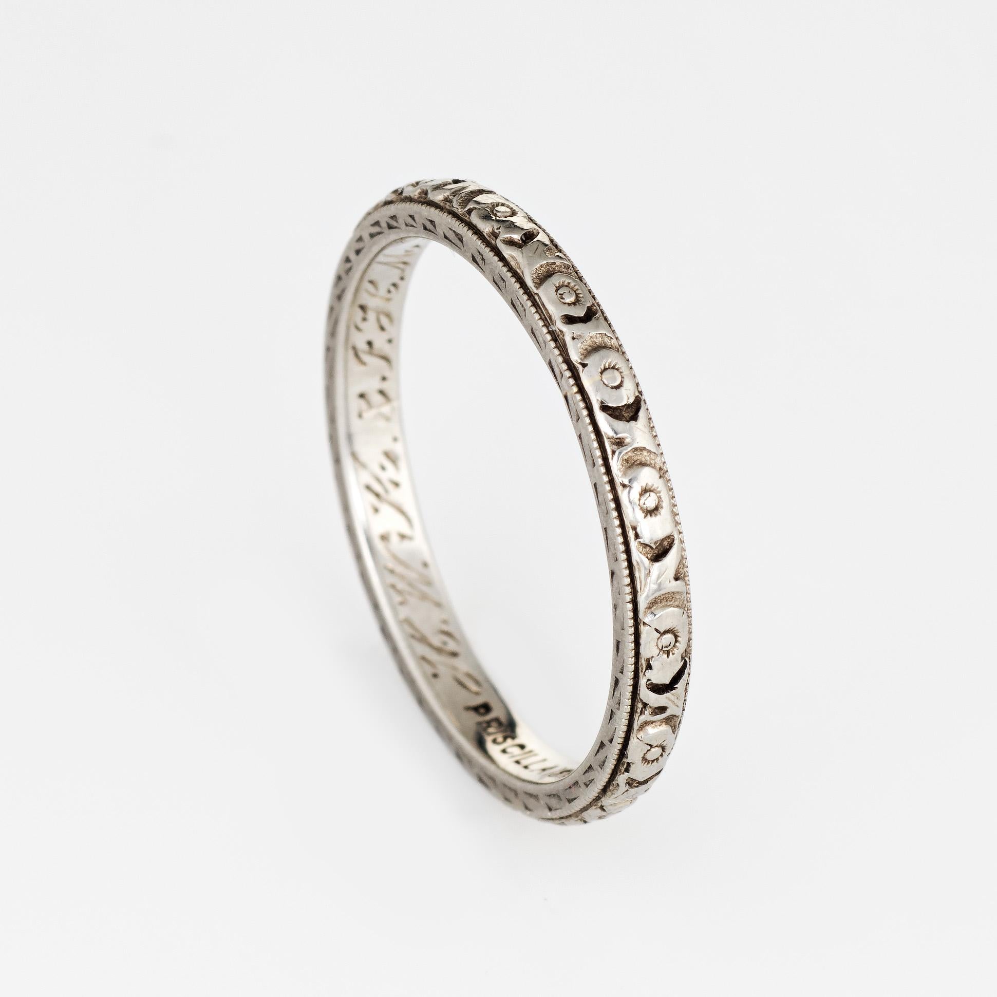 Elegant vintage Art Deco era band (circa 1920s to 1930s) crafted in 18k white gold. 

The ring epitomizes vintage charm and would make a lovely wedding band. Also great worn alone or stacked with your jewelry from any era. The inner band is 