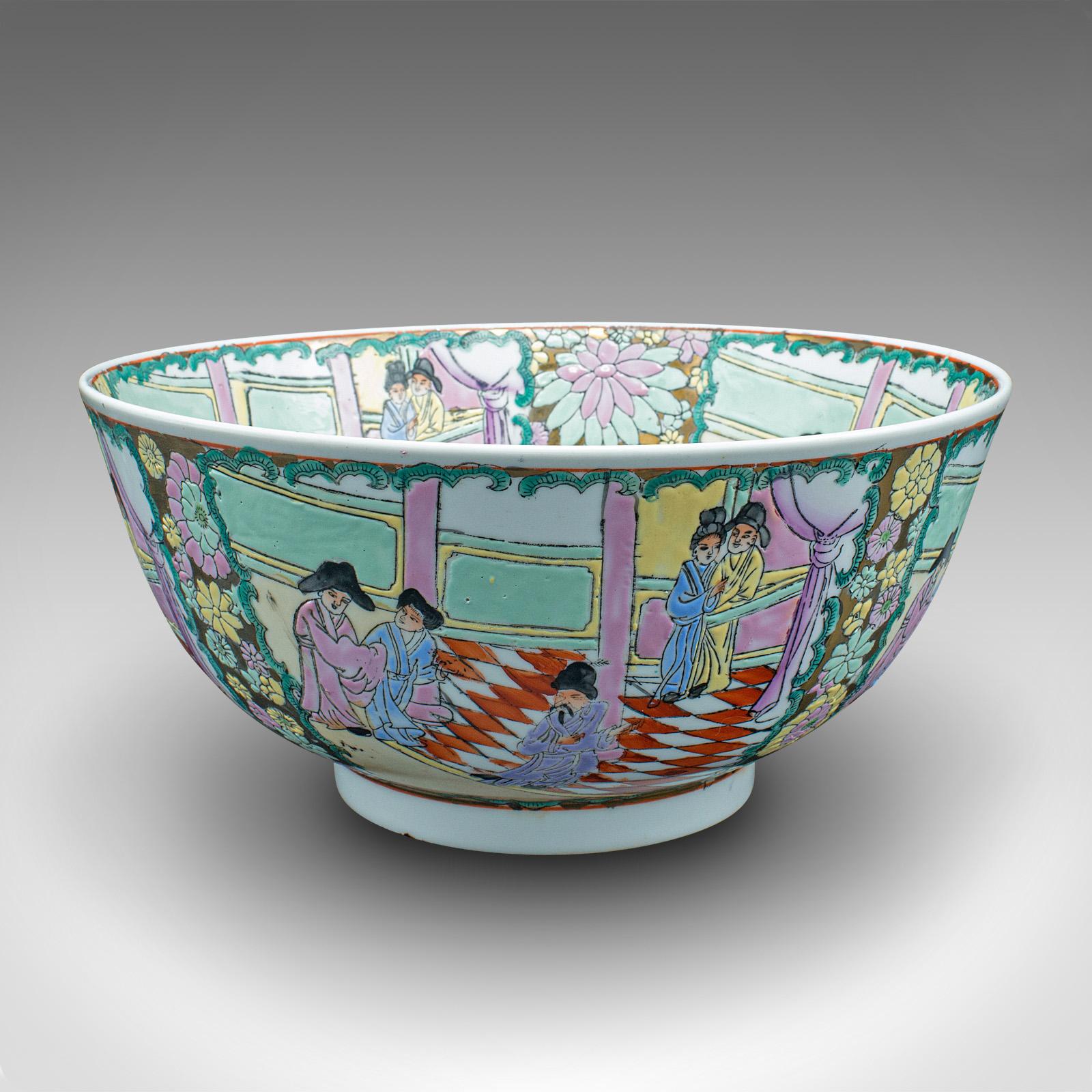 This is an antique decorative bowl. A Chinese, ceramic serving dish, dating to the late Victorian period, circa 1900.

Profusely decorated with delightful colours in a wonderfully traditional manner
Displays a desirable aged patina and in good