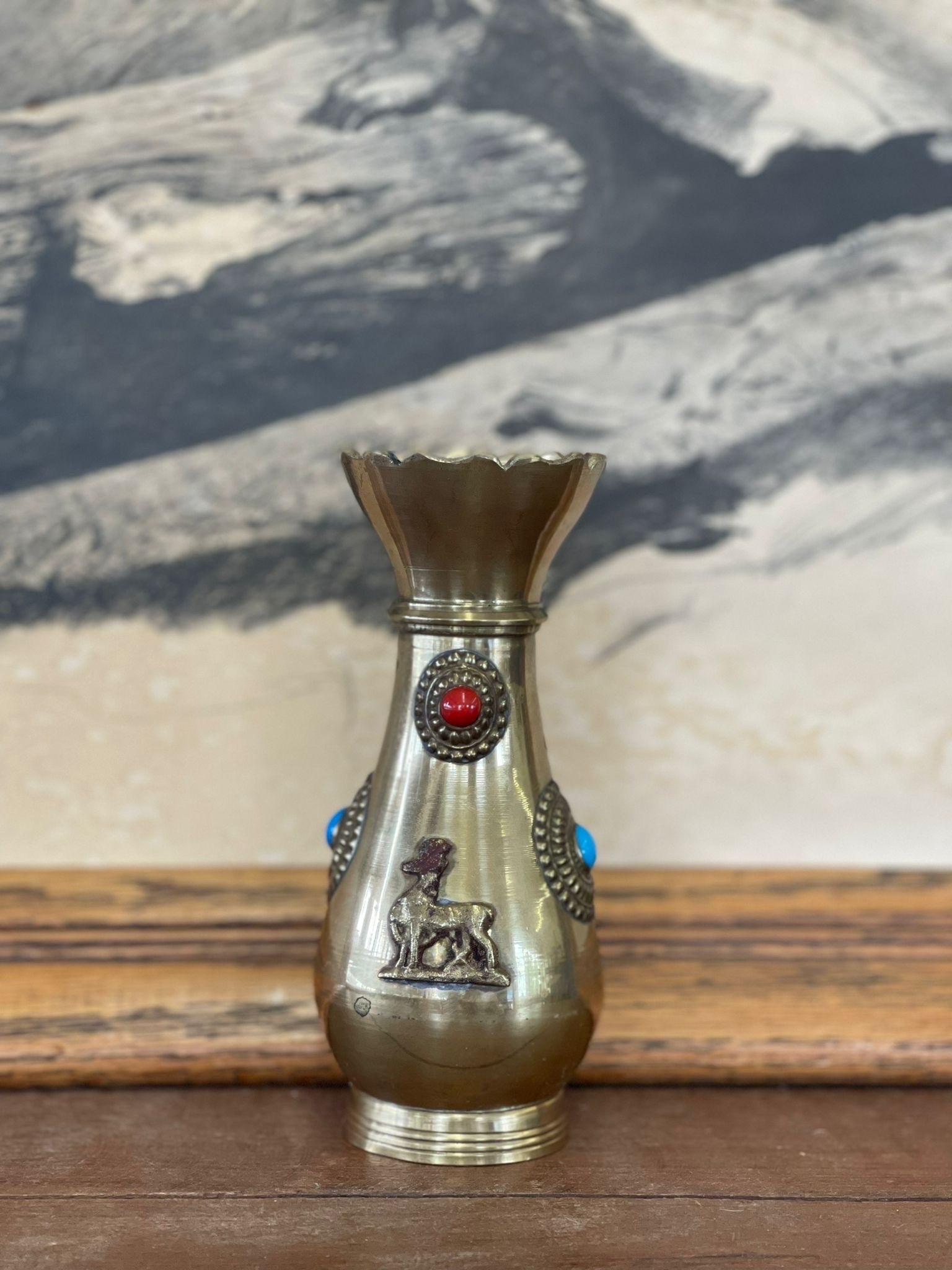 Antiqueq Decorative Brass Bejeweled Vase Red and Blue Accents Decor Art decor

Dimensions. 3 L ; 3 P ; 6 H