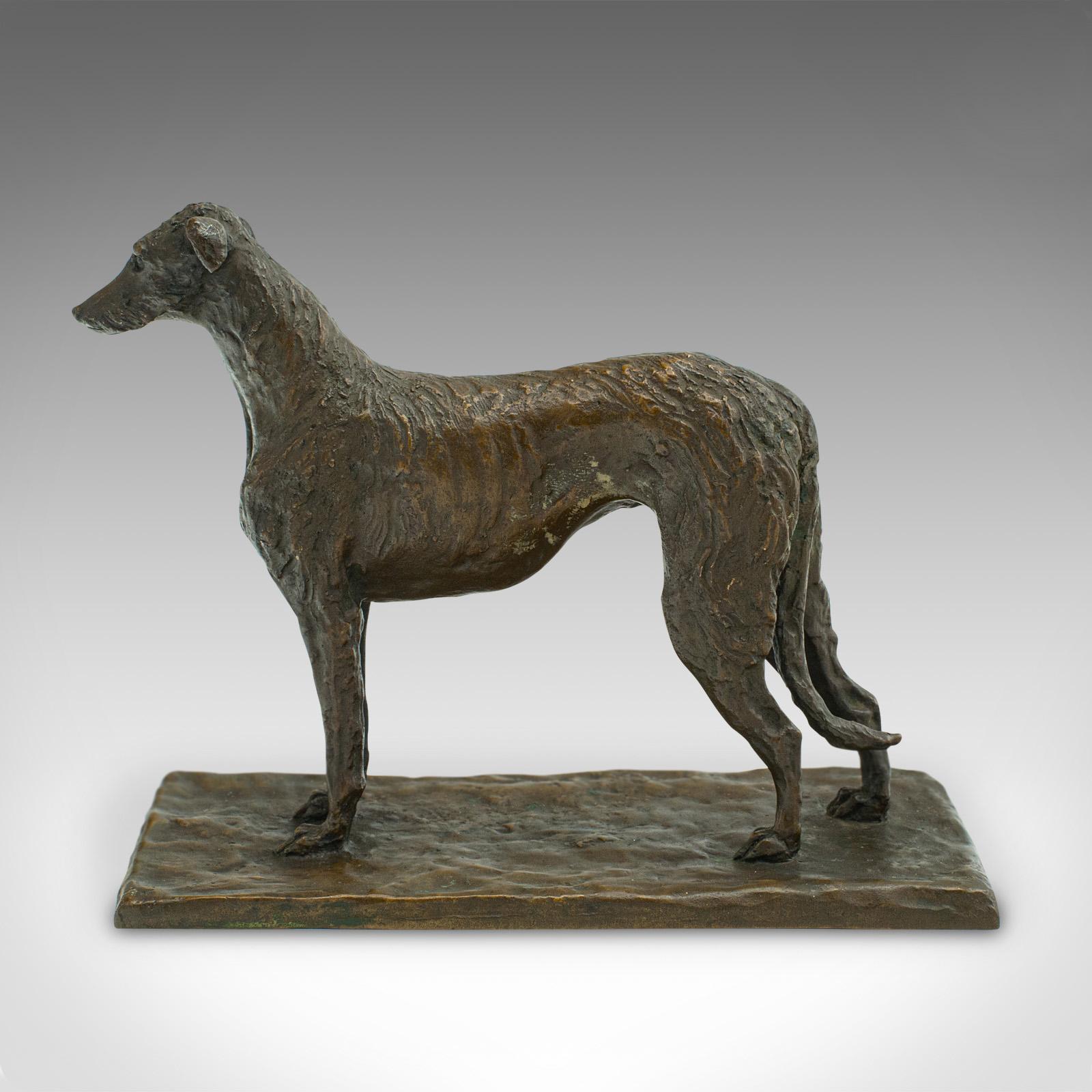 This is an antique decorative dog figure. An Austrian, bronze Viennese Borzoi hound, dating to the late Victorian period, circa 1900.

Tactile and endearing, a treat for the display case or mantle
Displaying a desirable aged patina in good original