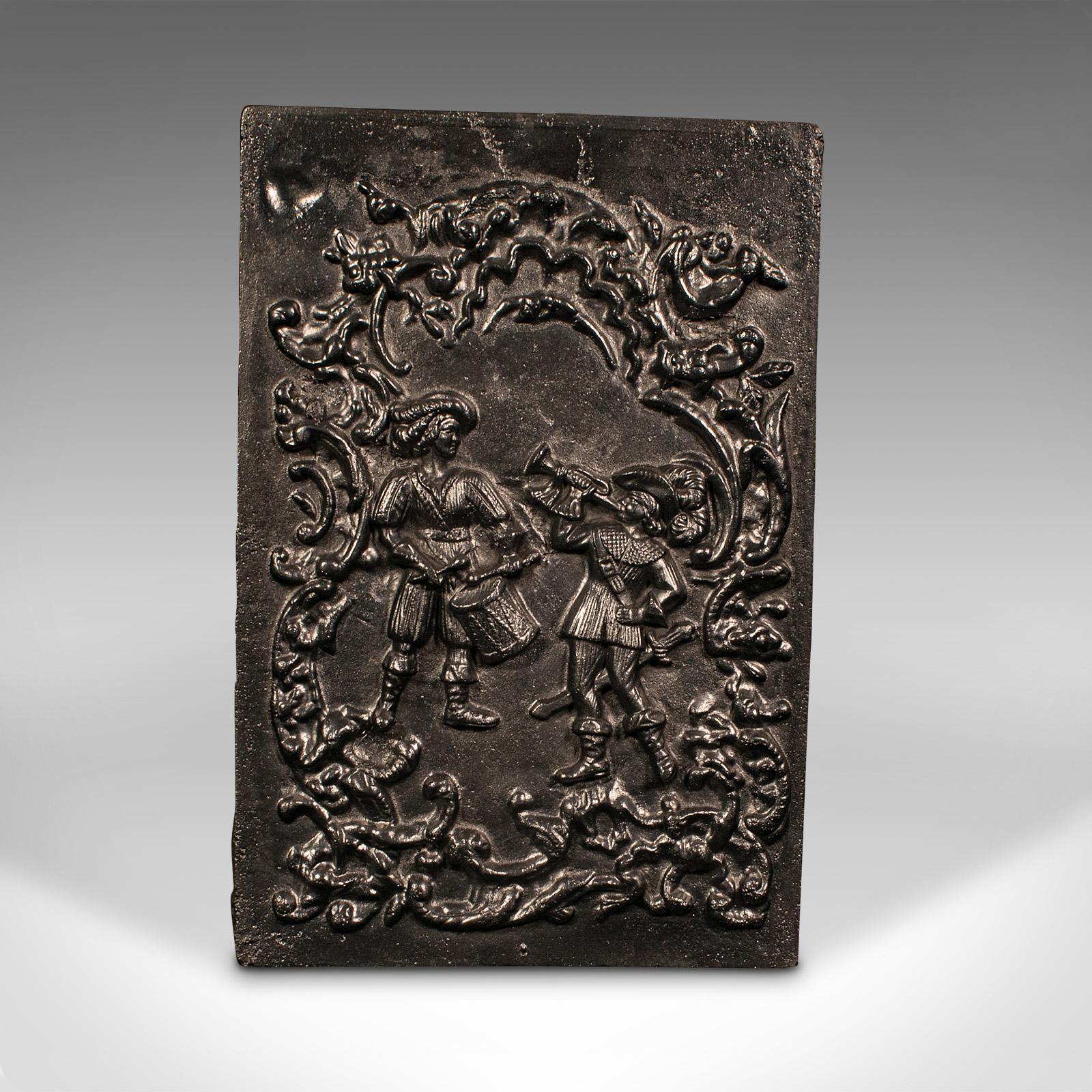 This is an antique decorative fire back. An English, cast iron hearth panel, dating to the mid Victorian period, circa 1850.

Charmingly decorative relief, ideal for adding interest to a traditional fireplace
Displaying a desirable aged patina