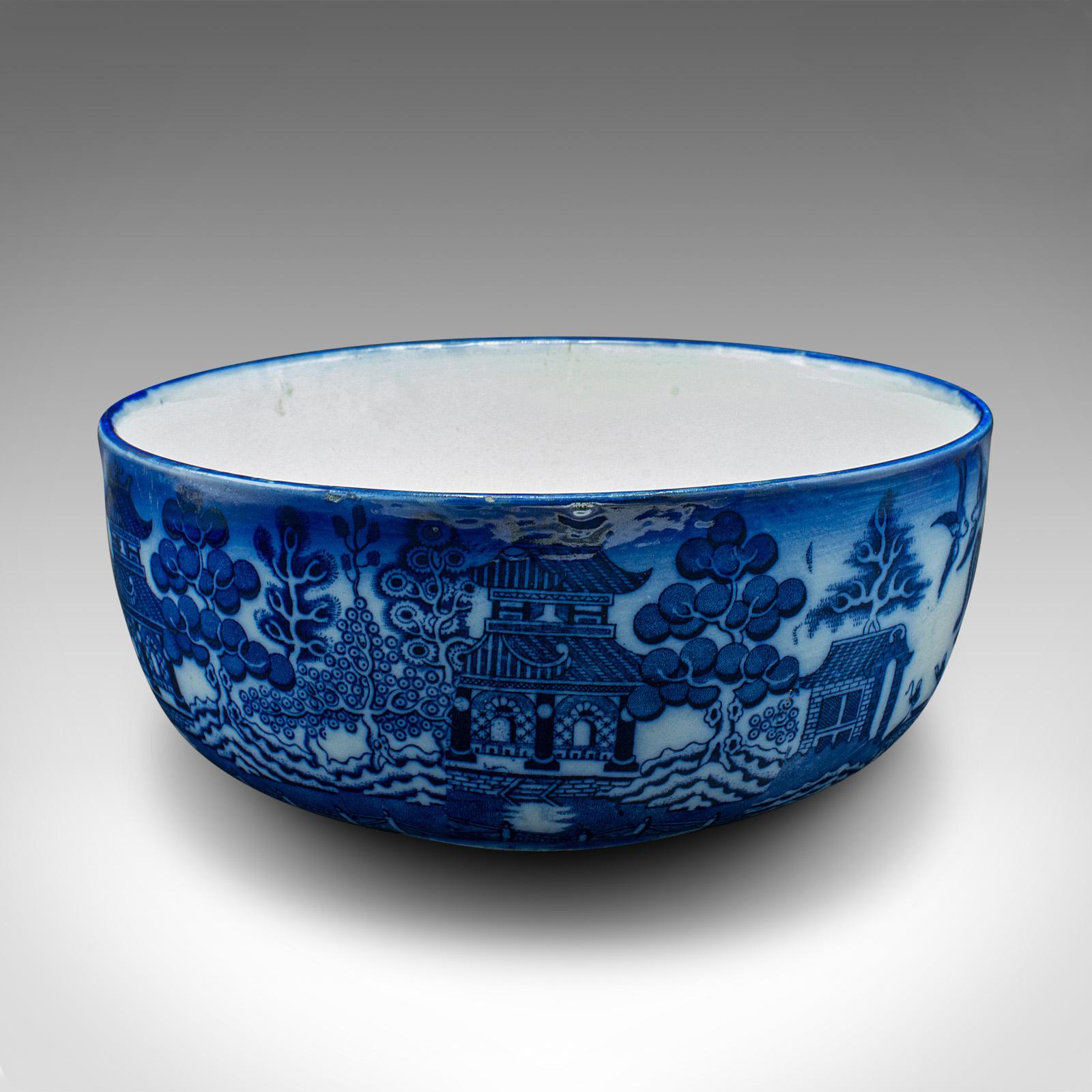 This is an antique decorative fruit bowl. An English, ceramic transfer printed serving dish, dating to the late Victorian period, circa 1900.

Appealing Victorian example of blue and white ceramics
Displays a desirable aged patina throughout
White