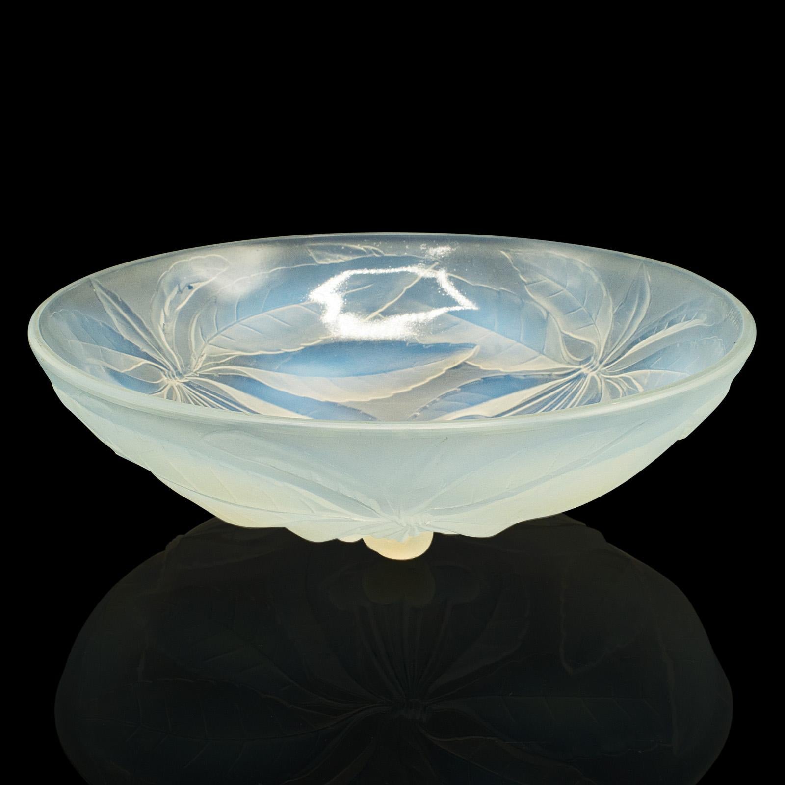 This is an antique decorative fruit bowl. A French, lead glass dish in Art Deco taste, dating to the early 20th century, circa 1920.

Striking lunar-esque hues and appealing glass forms
Displays a desirable aged patina and in good order
Lead