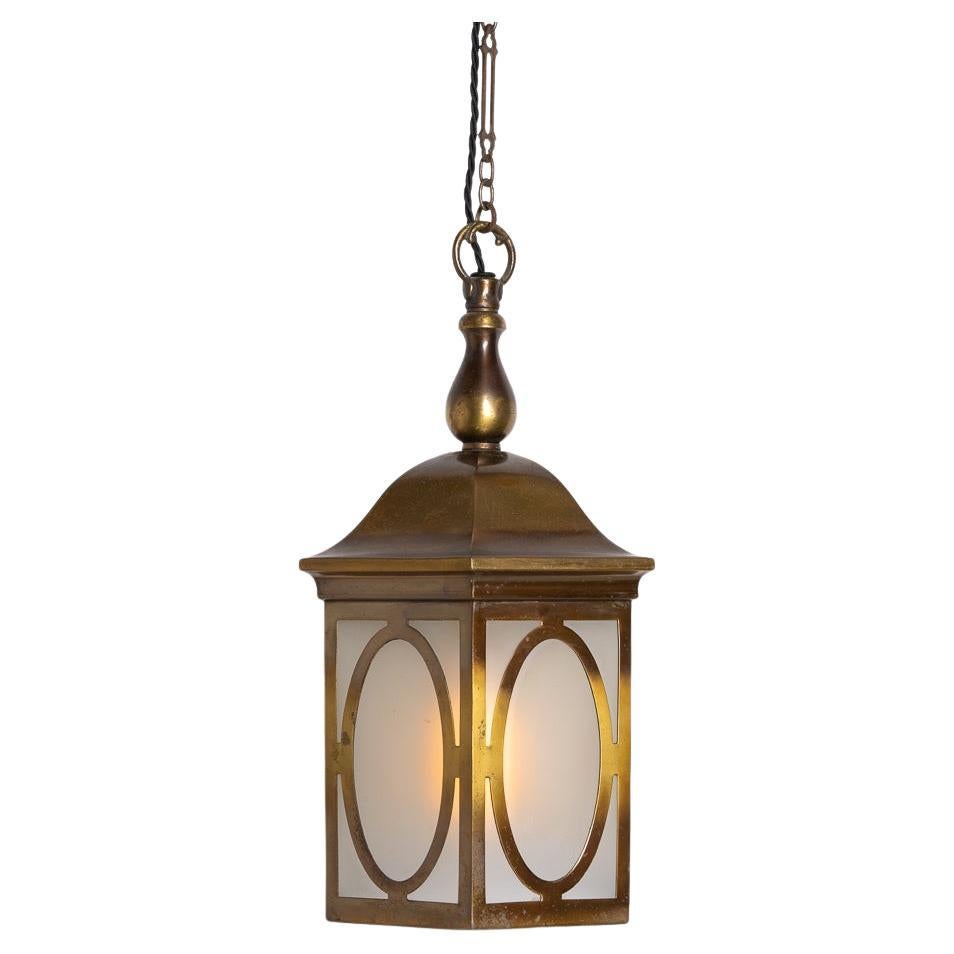 Antique Brass & Frosted Glass Hexagonal Lantern by GEC – Art Nouveau Cassell Model

A refined medium-sized pendant lantern by G.E.C (General Electric Co. Ltd), this elegant design was first introduced in the early 1920s and appears in their 1926