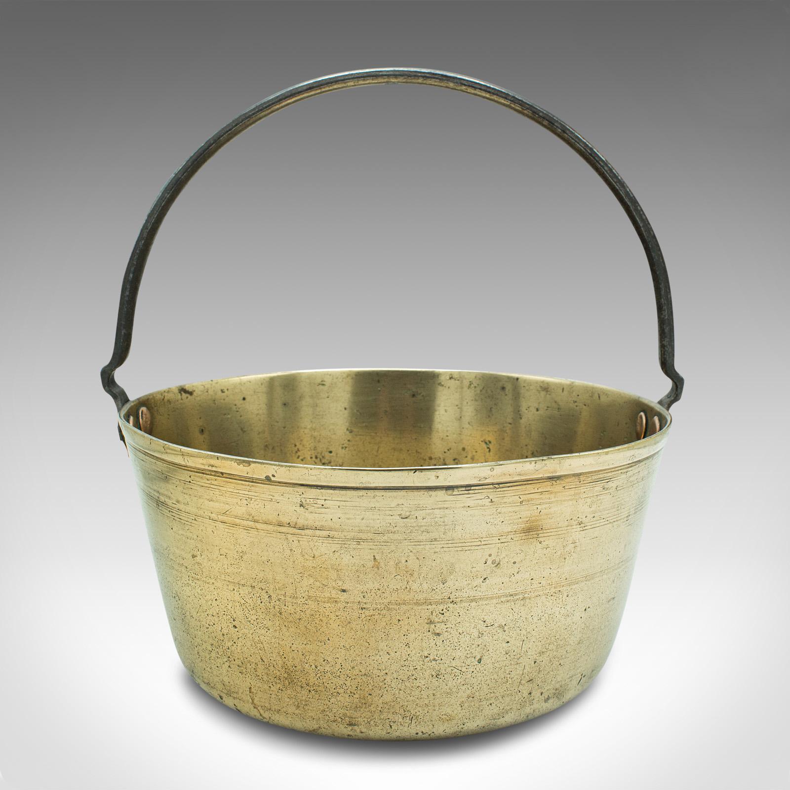 This is an antique decorative jam pan. An English, brass planter or jardiniere, dating to the Georgian period, circa 1800.

Delightfully polished pan with a lightly weathered appearance
Displays a desirable aged patina and in good original