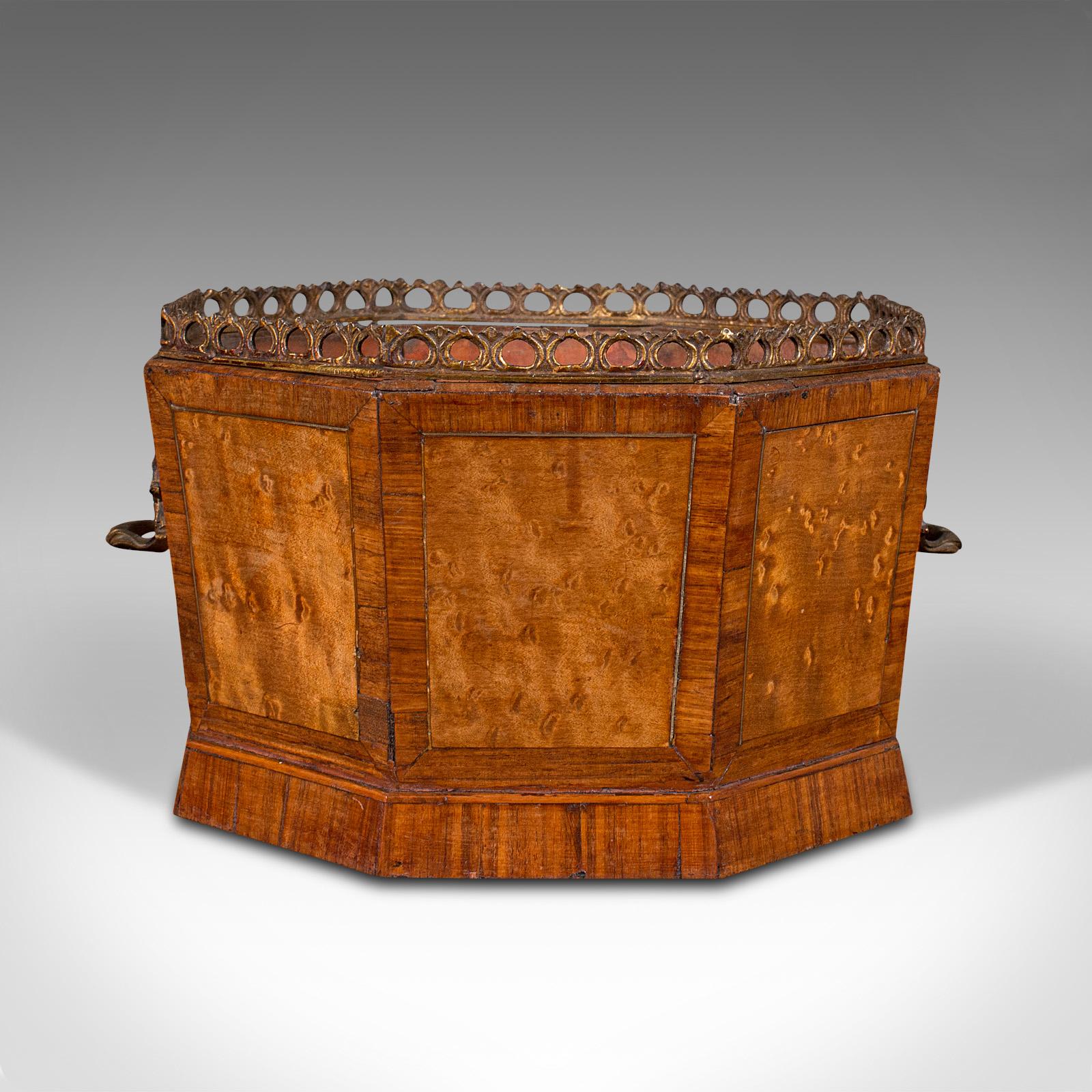 This is an antique decorative jardiniere. An English, bird's eye maple planter pot with octagonal form, dating to the Regency period, circa 1820.

Striking figuring and colour presents a fascinating appeal
Displays a desirable aged patina and in