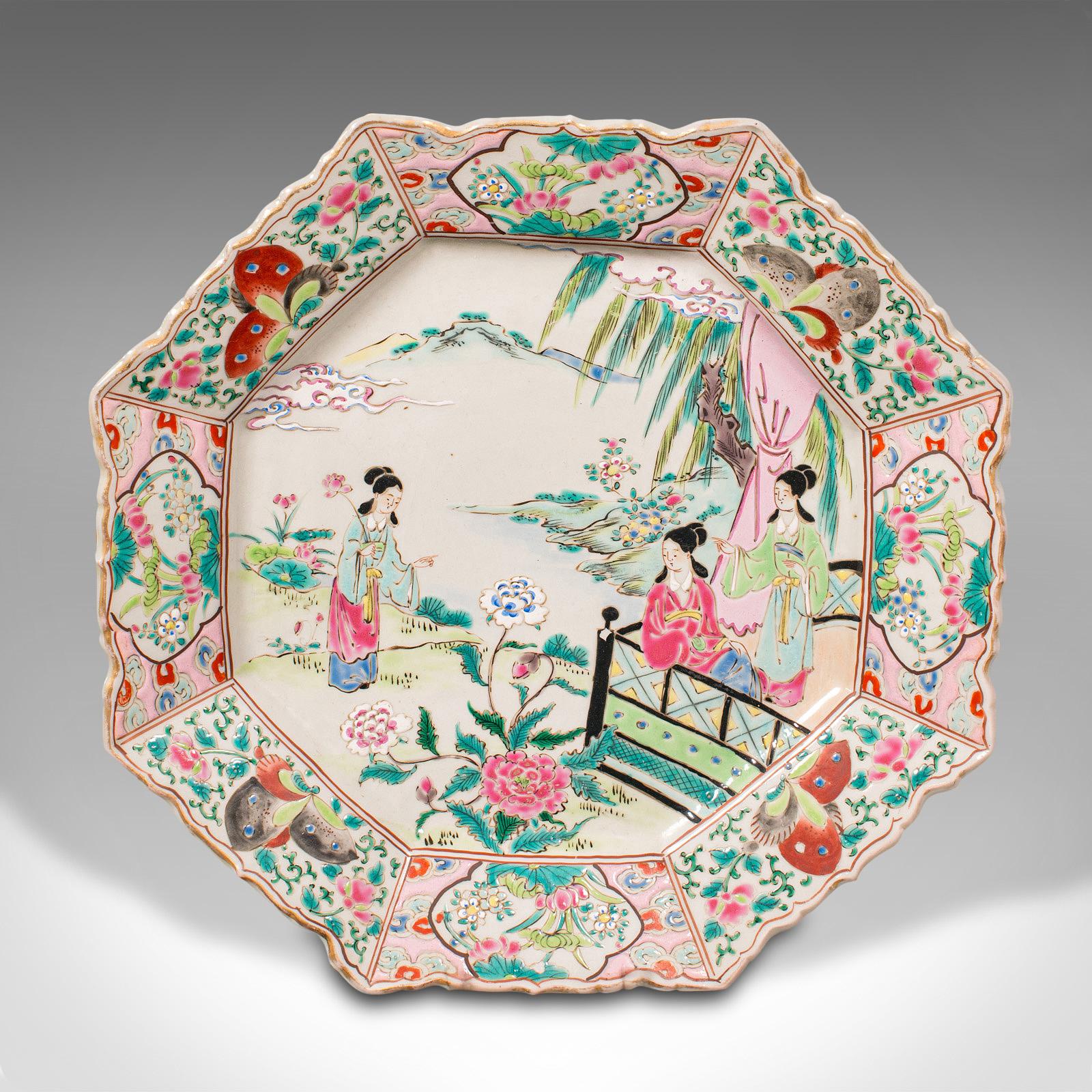 This is an antique decorative serving plate. A Japanese, ceramic octagonal charger in Meiji taste, dating to the late Victorian period, circa 1900.

Superb decorative appeal with traditional Japanese artistry
Displaying a desirable aged patina and