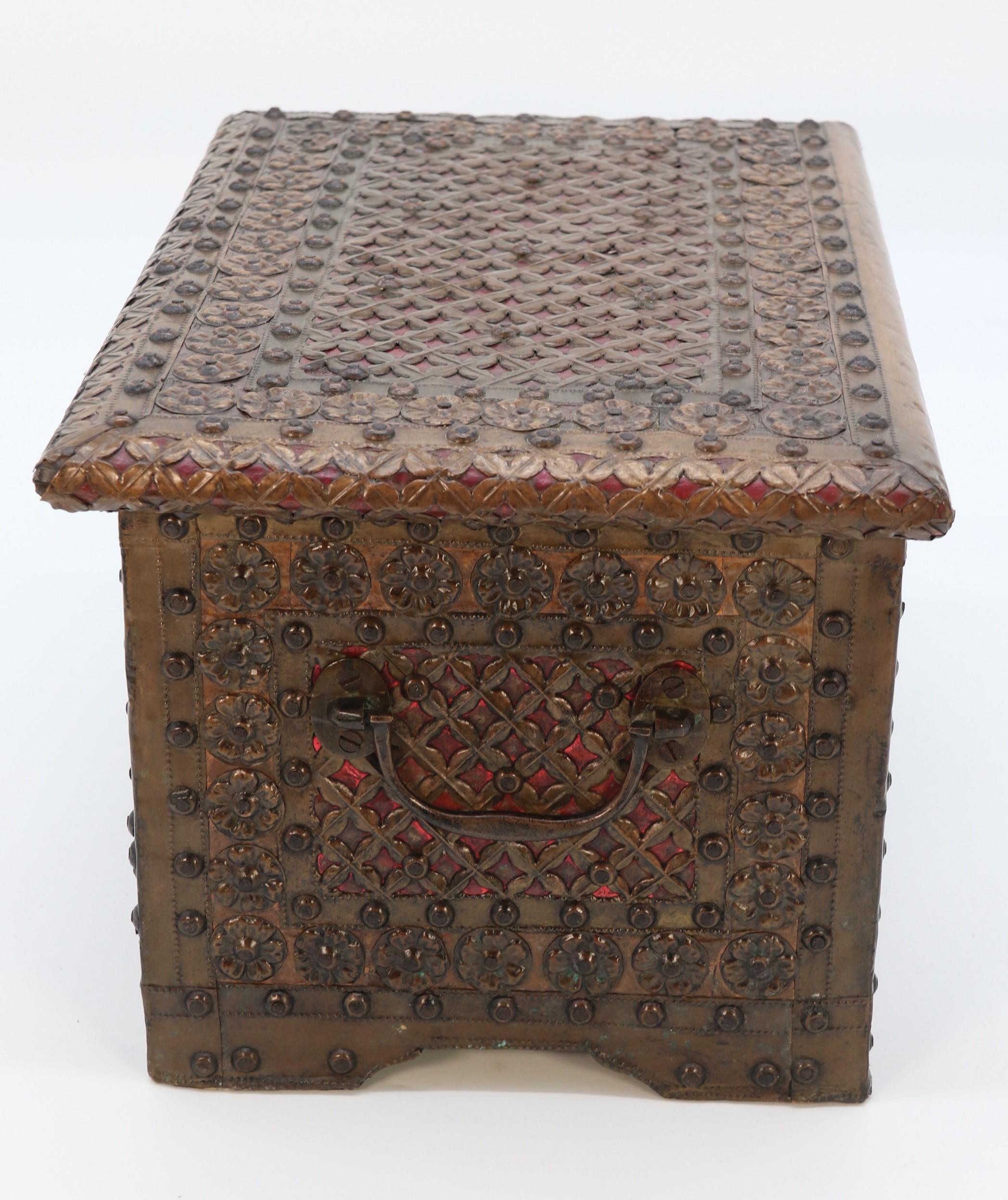 Hand-Crafted Antique decorative small Zanzibar brass and copper mounted chest or strongbox For Sale