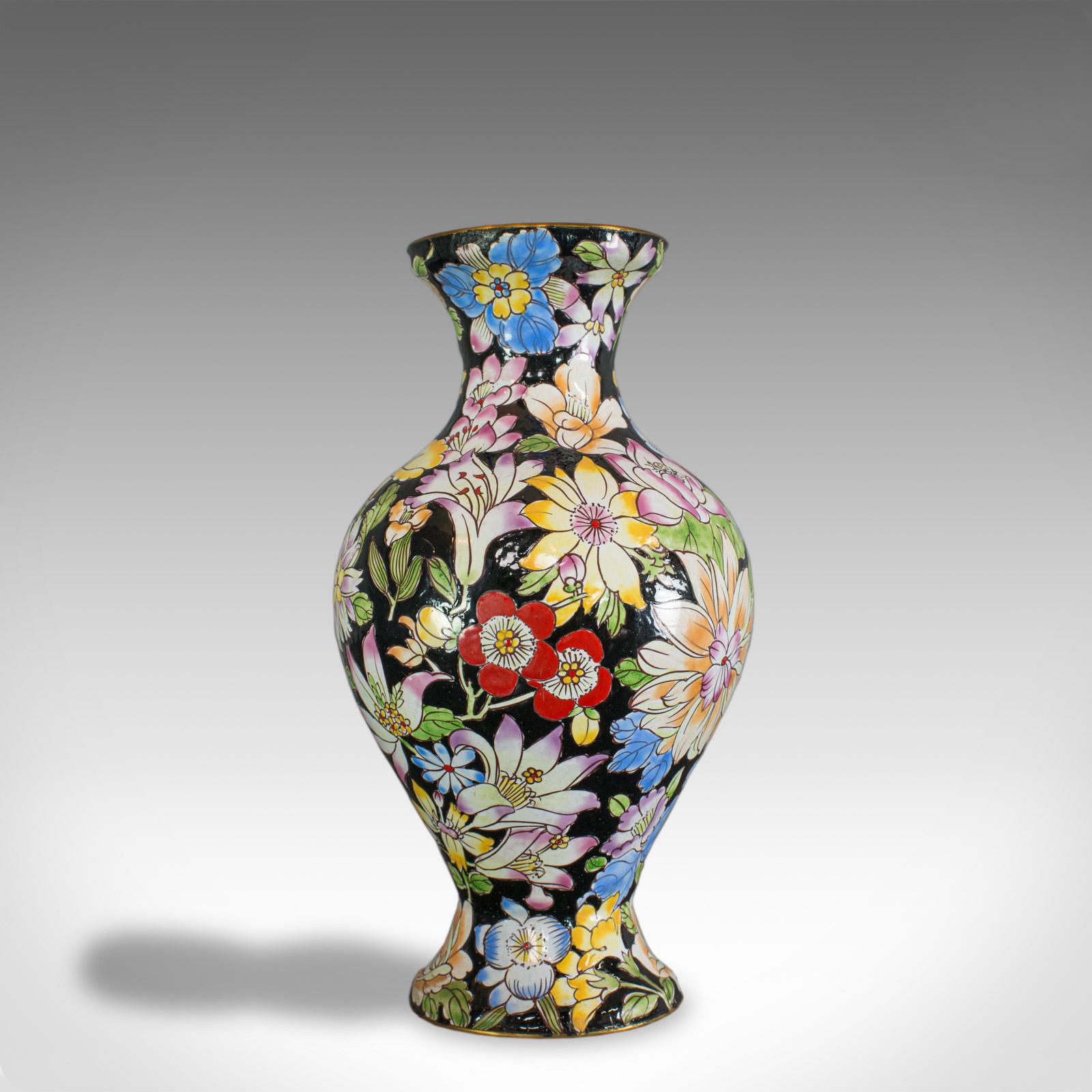 This is an antique decorative vase. A French, cloisonné baluster urn, dating to the Victorian period of the late 19th century, circa 1880.

Pleasing example of French cloisonné
Profusely decorated with foliate detail
Rich colorful palette on a