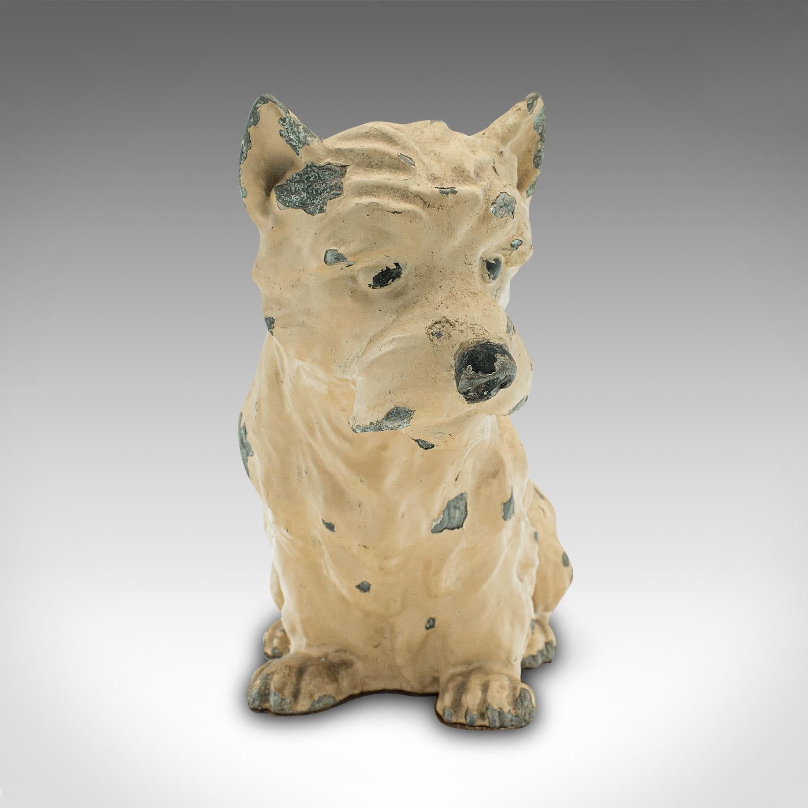 This is an antique decorative West Highland Terrier. A British, spelter ornamental Westie dog, dating to the Edwardian period, circa 1910.

Nicely detailed dog ornament with copious character and charm
Displays a desirable aged patina and in good