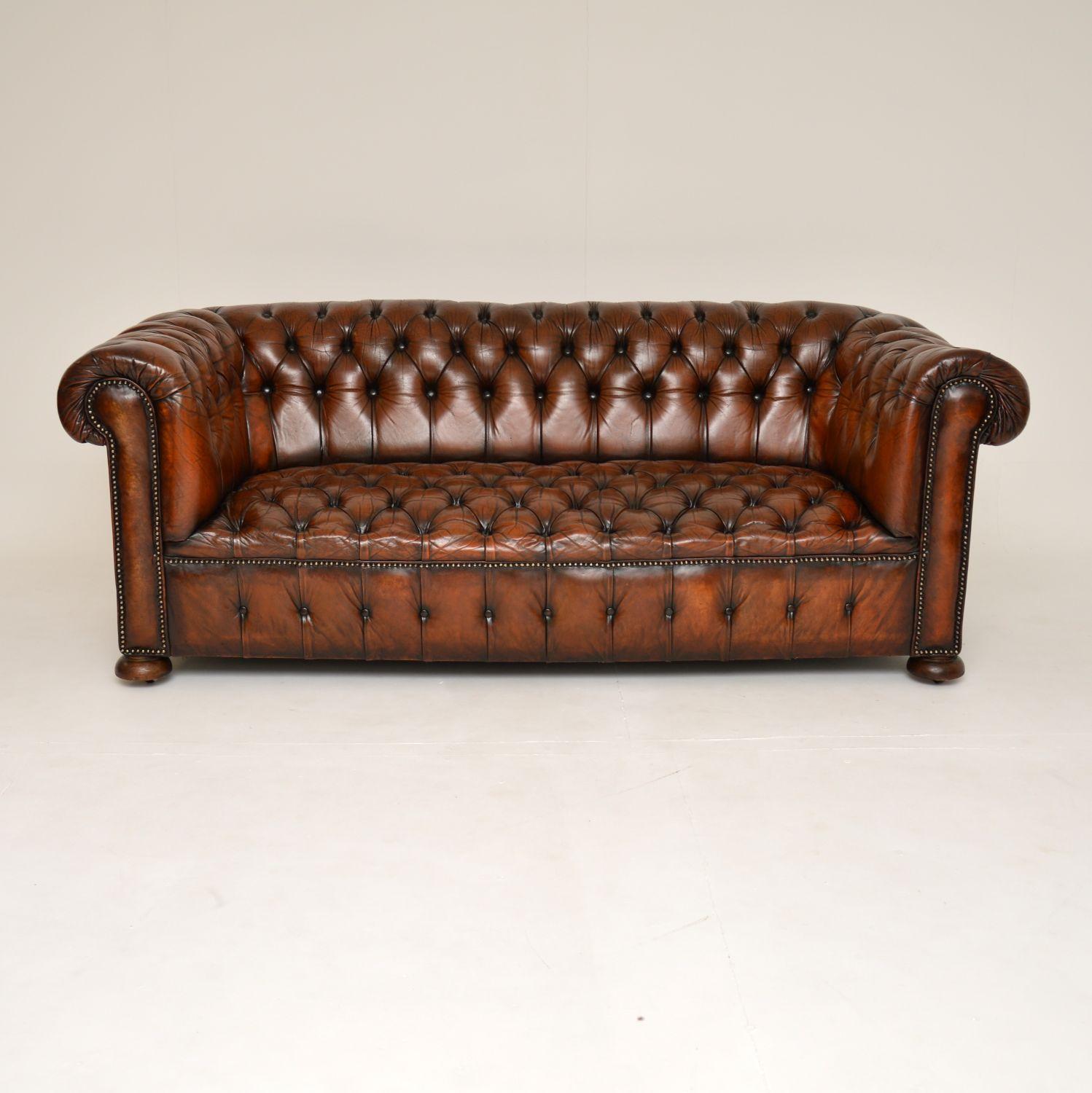 A fabulous antique deep buttoned leather Chesterfield sofa. This was made in England, it dates from around the 1950-60’s.

It is very well made and has a stunning colour tone, having recently been hand coloured and revived by our leather restorer.