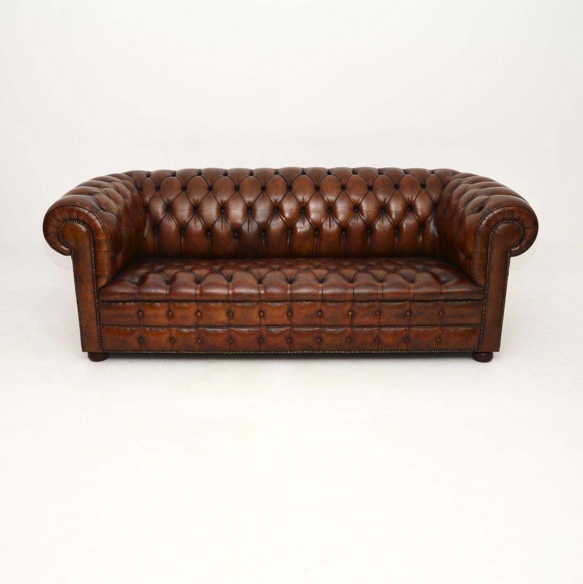 A smart and very well made antique deep buttoned leather Chesterfield sofa. This was made in England, it dates from around the 1930’s.

The quality is superb, this is a great size, it is well padded and very comfortable. The deep buttoned leather