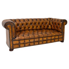 Antikes tief geknöpftes Leder Chesterfield Sofa