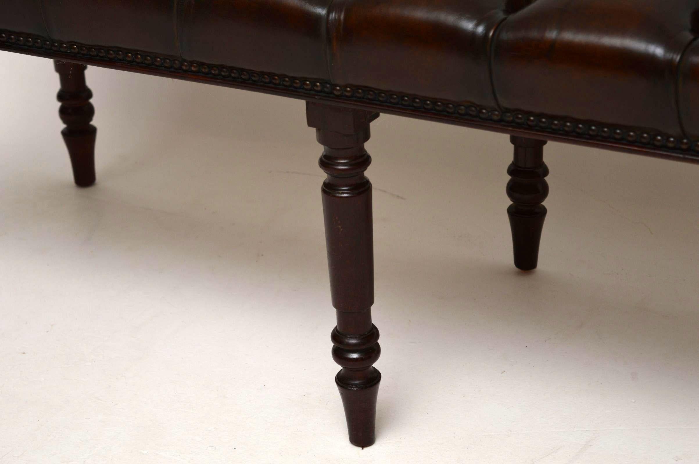 English Antique Deep Buttoned Leather Stool on Mahogany Legs