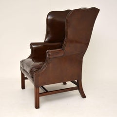 Antique Deep Buttoned Leather Wing Back Armchair