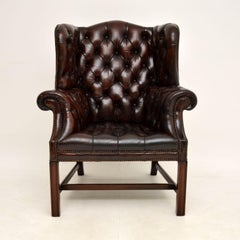 Antique Deep Buttoned Leather Wing Back Armchair