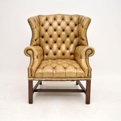 Antique Deep Buttoned Leather Wing Back Armchair