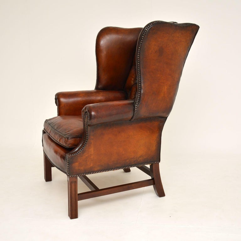 Chippendale Antique Deep Buttoned Leather Wing Back Armchair For Sale