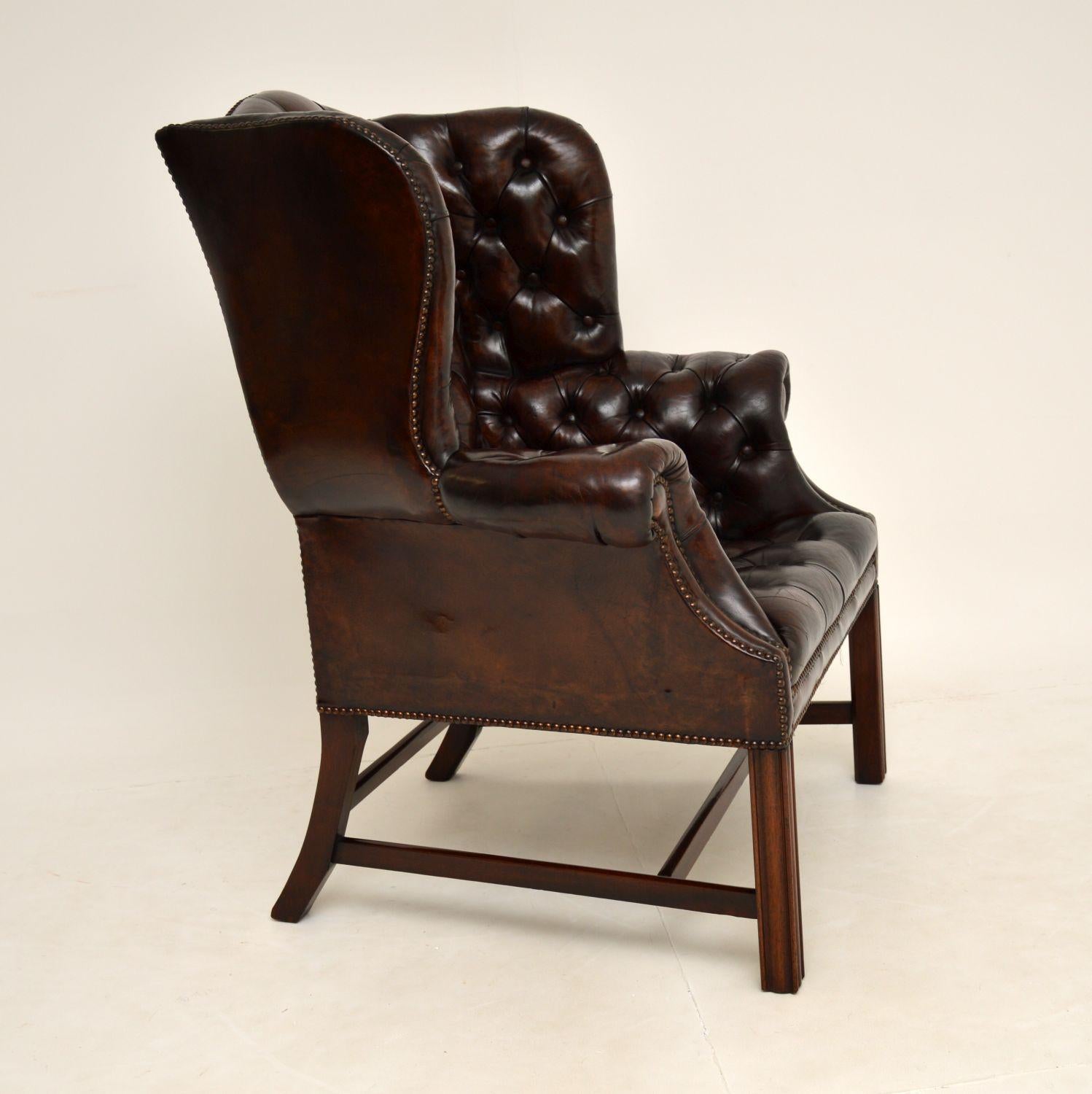 Antique Deep Buttoned Leather Wing Back Armchair 1