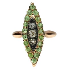 Bague ancienne en or avec démantoïde et diamant taillé à l'ancienne
