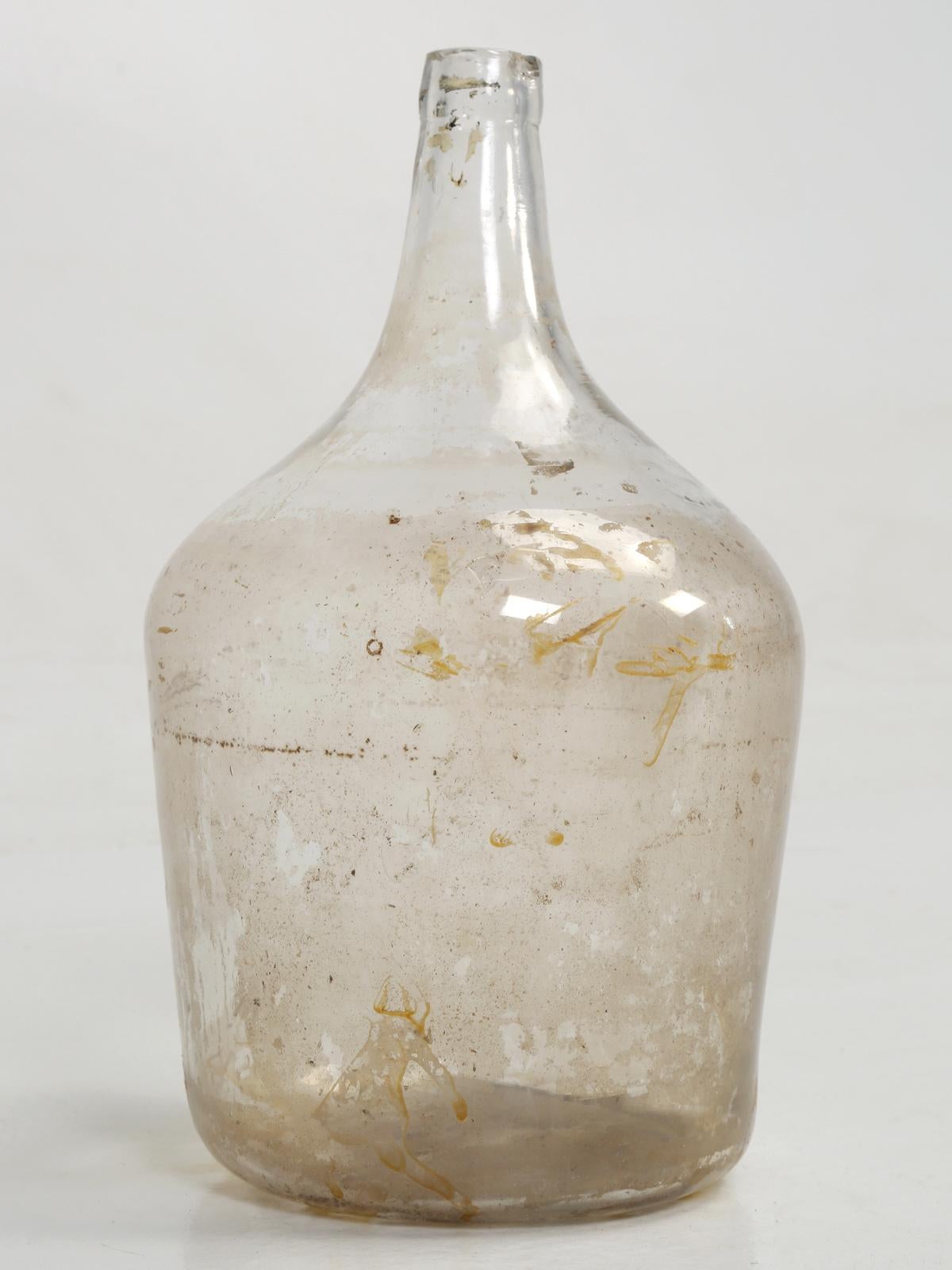  Carboy, demijohn or jimmyjohn, they all refer to glass containers. The name Carboy originated in Persia from the word; qarabah. Demijohn is French for; dame-jeanne, or Lady Jane  from the 1600's. Demijohns are any glass vessel, with a large body,