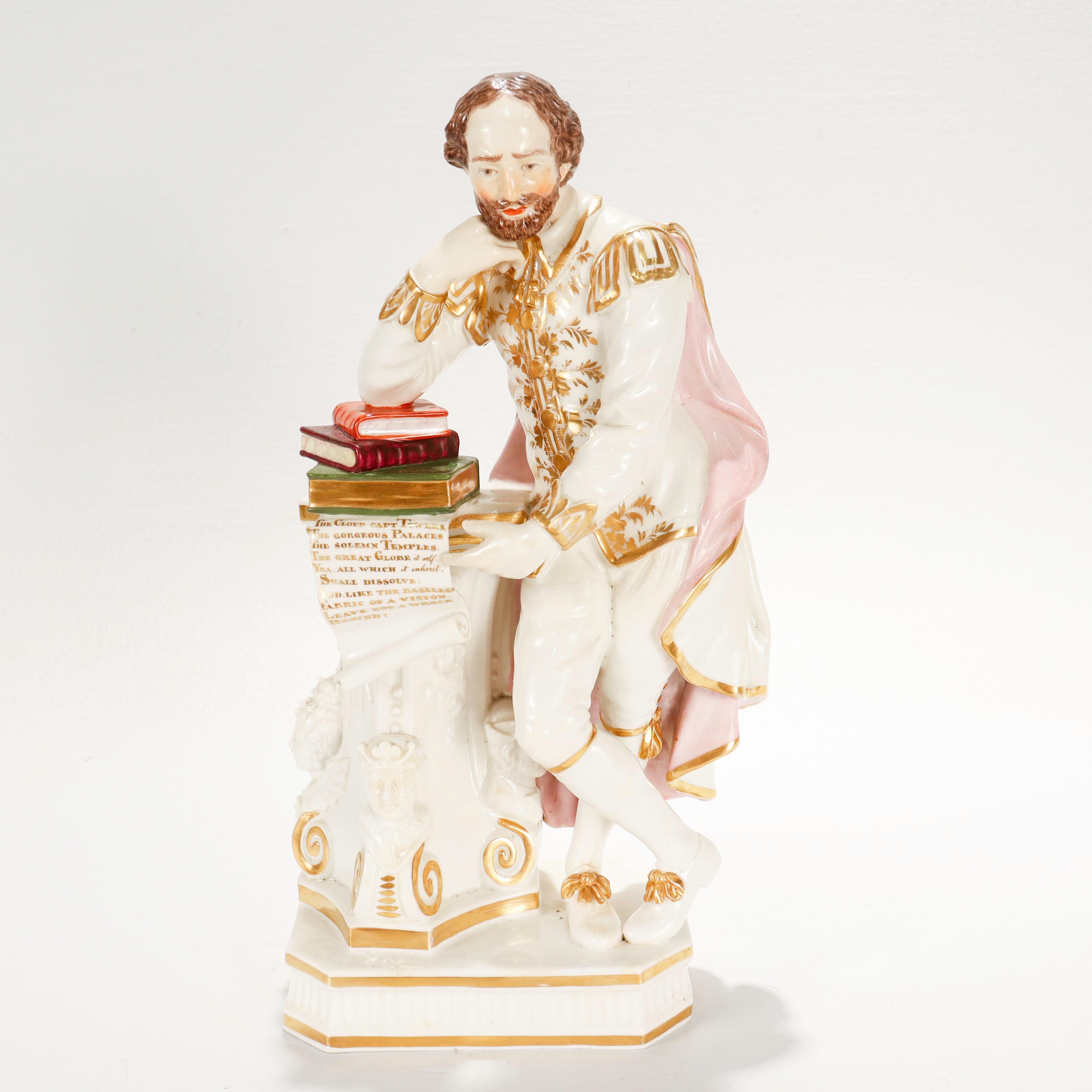 A fine antique English porcelain figurine.

By Derby.

In the form of William Shakespeare. 

Depicting a Shakespeare that leans onto a book-covered plinth with his hand supporting his chin. His other hand points to a scroll that dangles from