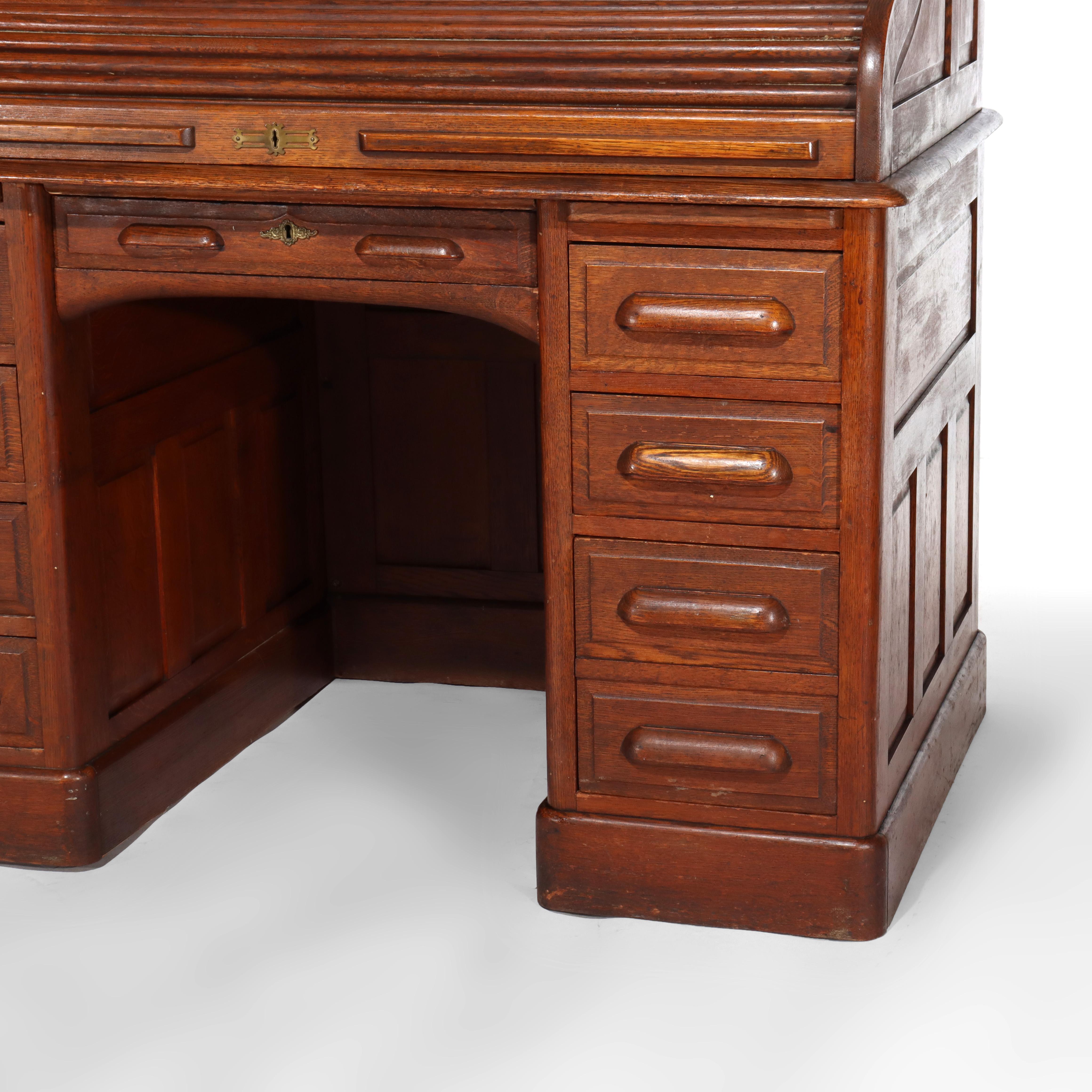 ***Reduced In-House Delivery Rates - Click on “Ask Seller” to Request a Quote***
Antique Derby School Oak Paneled Roll Top Desk C1900.
Measures - 49 1/2