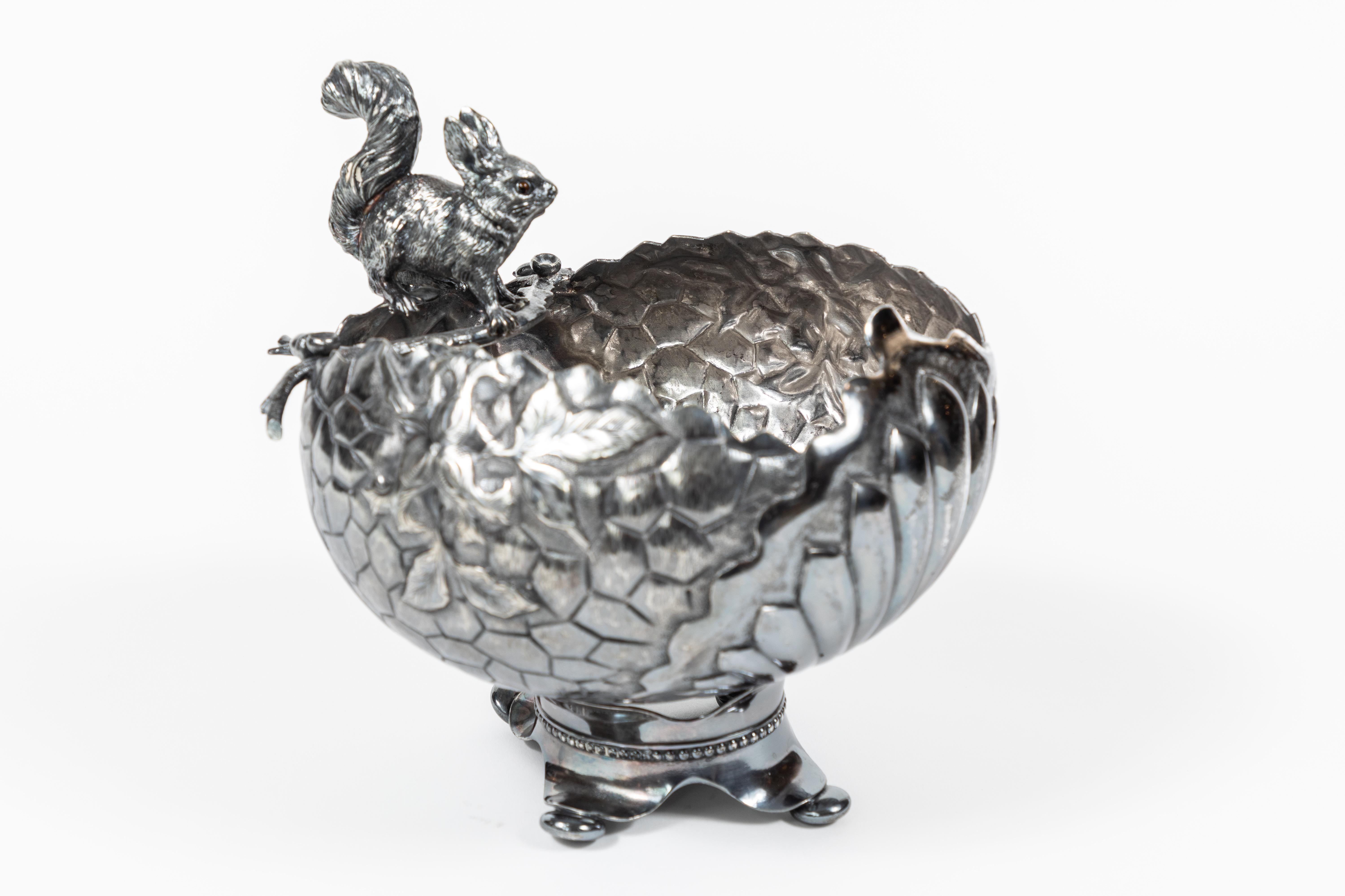 An outstanding example of a Victorian footed silverplate nut bowl with squirrel on a branch detailing by Antique Derby Silver Company. It is personally engraved with '1864 -1889  Mr. & Mrs. JB Miller'

Stamped:
Derby Silver Bo
Quadrupole Plate
4810.