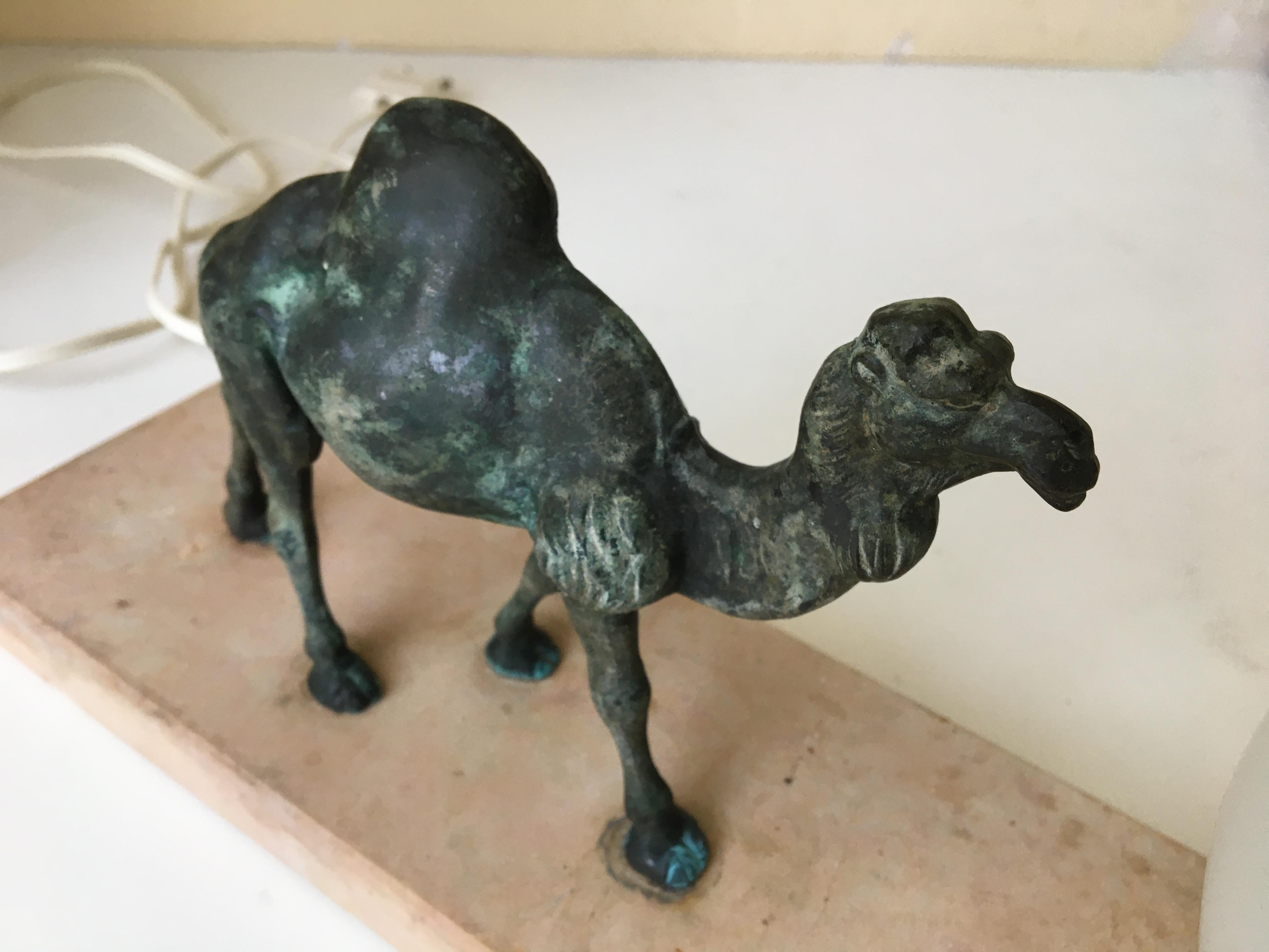 Super nice lamp with camel from the Art Deco France period.
The lamp and camel stand on a marble base.
The camel is made of bronze
It is very atmospheric when the light is on, just like in the desert.
Fitting is new but the cord is old. Free