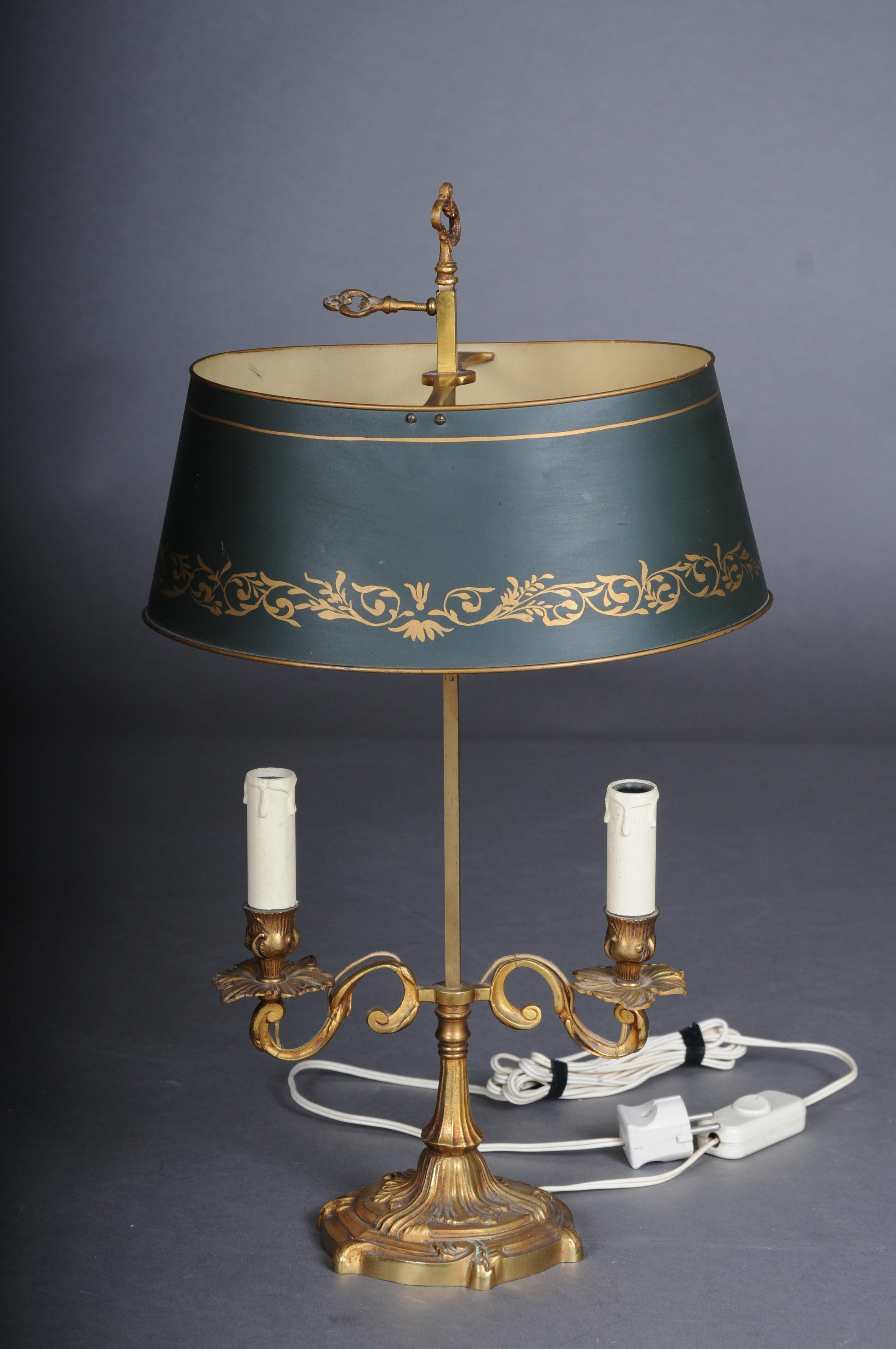 Antique desk lamp / table lamp Empire circa 1900, gold-plated bronze.

Solid bronze, fire-gilt, France circa 1900.
Table map with 2 sockets, electrified. finely chiselled bronze with a green shade, height adjustable. . quality workmanship. Very
