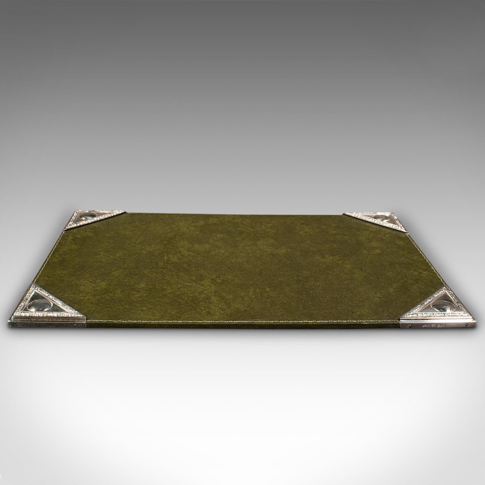 This is an antique desk pad by noted English maker Barker-Ellis. An English, leather and silver plate writing blotter, dating to the early 20th century, circa 1920.

Wonderfully appointed pad, perfect for the executive desk
Displays a desirable