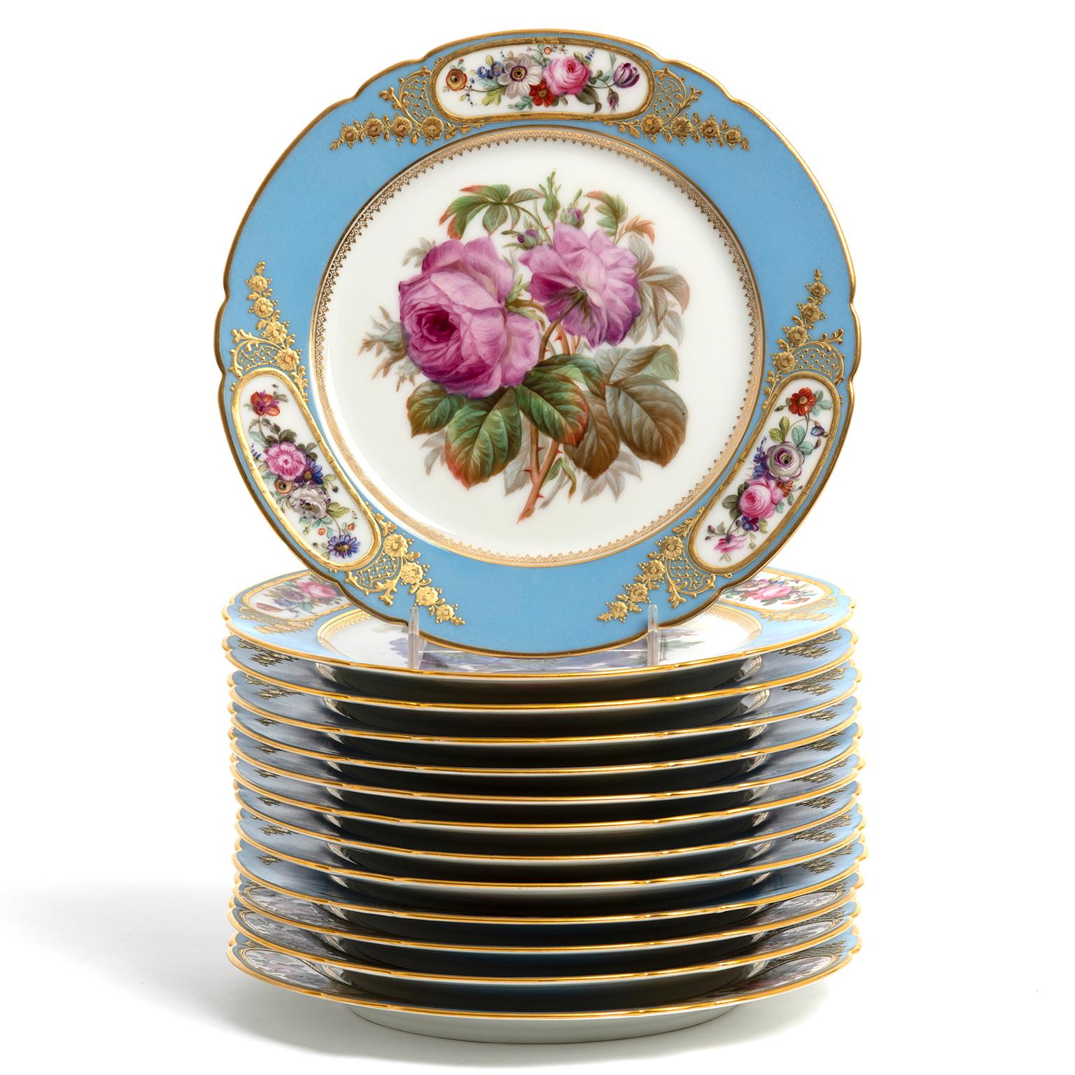 Circa 1840s, by François-Eugene Rousseau, Paris, France.  Hand-painted and multi-motif, this gold medal one-of-a-kind set is stunning! Old school Parisian charm at its museum quality best, this set includes thirteen plates, two tazzas, and one