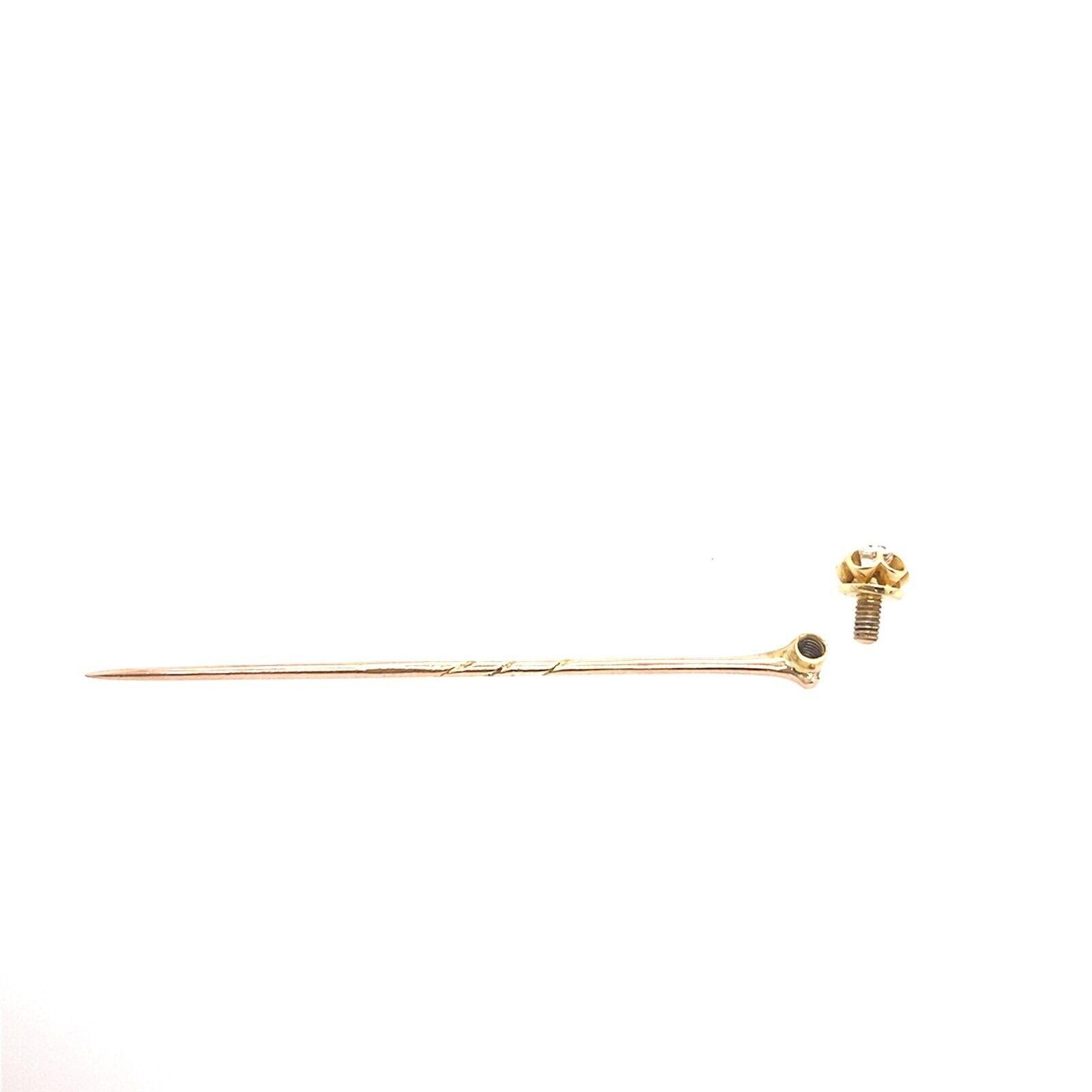 This stunning stickpin in 14ct Gold head and 9ct Gold pin, features a 0.12ct G colour VS purity Victorian cut Diamond. The Diamond is set in a classic claw setting - the head is removable with base metal pin protector.

Additional Information:
Total