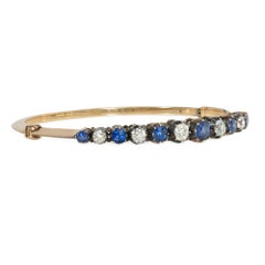 Antique diaAntique diamond and sapphire half hmond and sapphire half hoop bangle