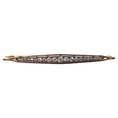 Antique Diamond 1.20 Carats Bar Brooch Set in Silver 18 Carats Yellow Gold