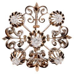 Broche ancienne en or rose 14 carats et argent