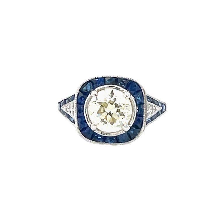Antique Cushion Cut Antique Diamond 1.50 carats & Blue Sapphire 2.00 carats Ring in Platinum For Sale