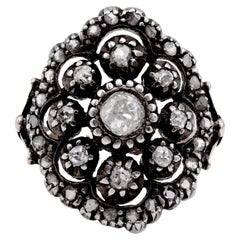 Bague cocktail fleur ancienne en or jaune 18 carats et argent