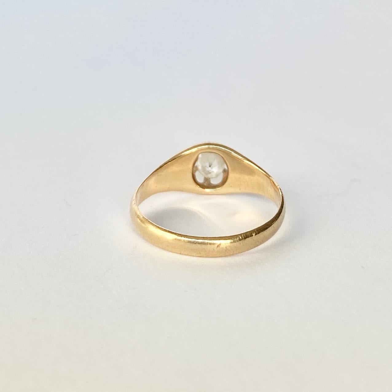 This classic band is modelled in 18carat gold and the old mine cut diamond which is set in the star setting measures 20pts. 

Size: J 1/2 or 5

Weight: 2.3g
