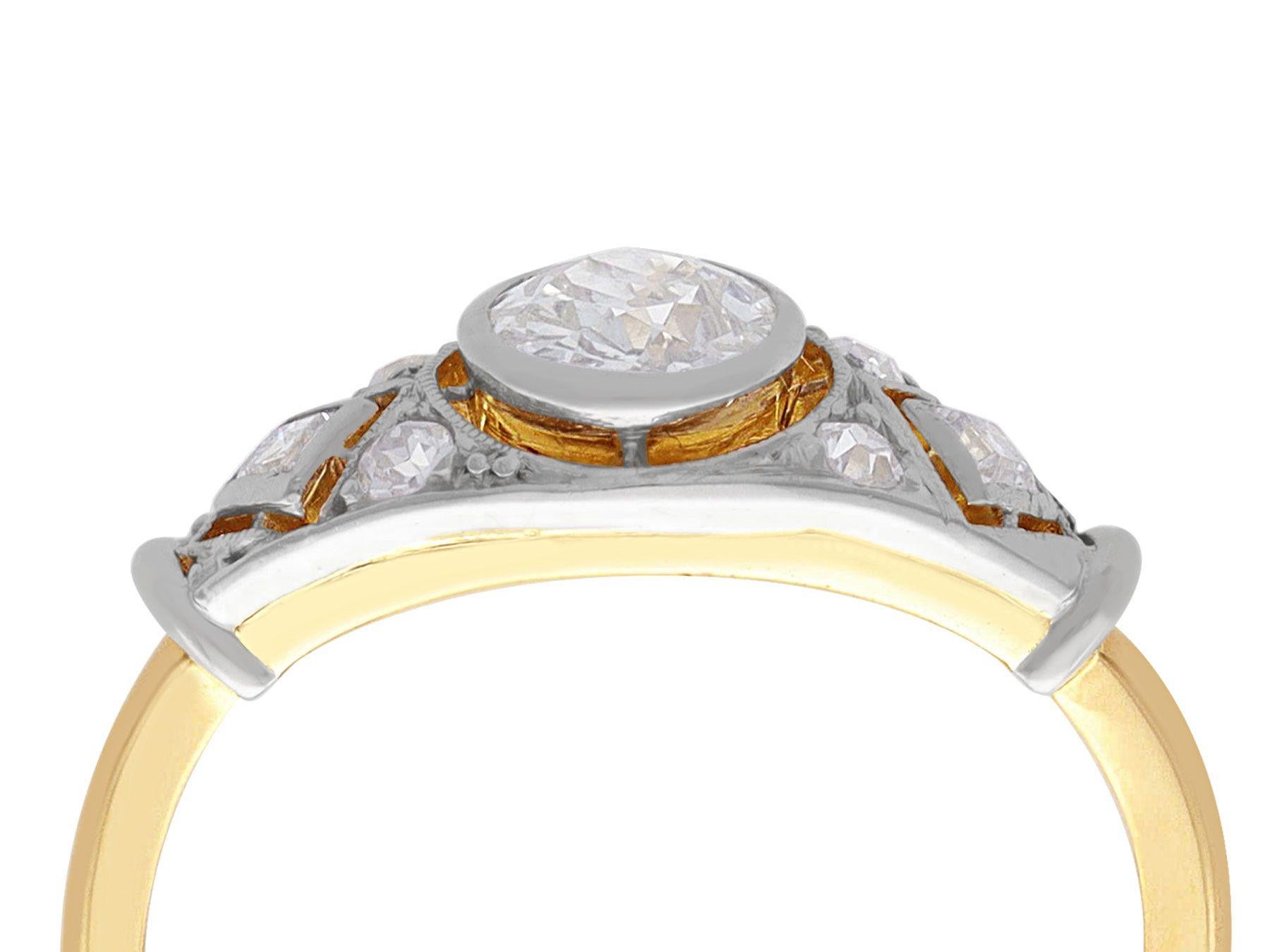 A fine and impressive 0.83 carat diamond, 18 karat yellow gold and platinum solitaire ring; part of our diamond engagement ring collections.

This stunning, fine and impressive 1920s solitaire diamond ring has been crafted in 18k yellow gold with a