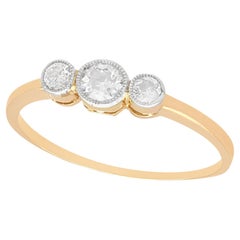 Bague trilogie ancienne en or jaune 18k et diamant, circa 1920