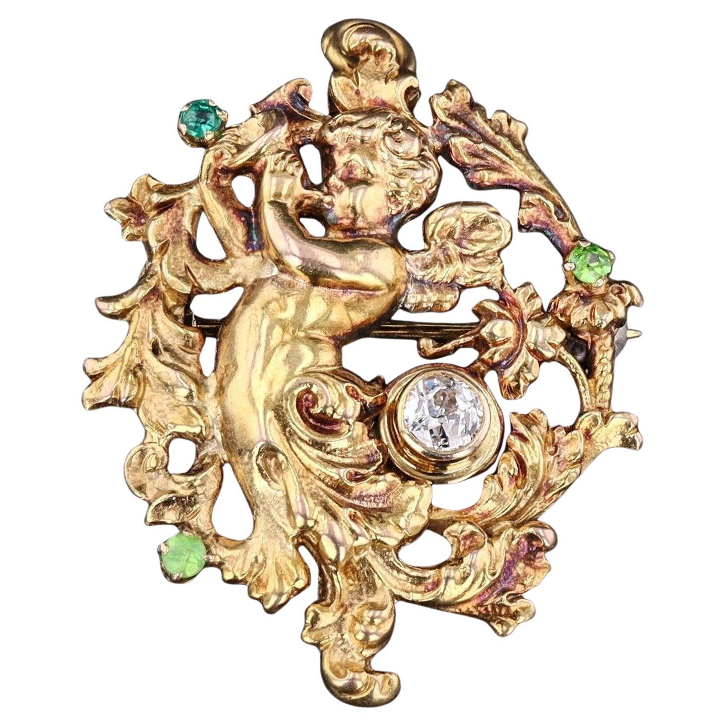 Antiguo Colgante Querubín de Diamantes y Granate Demantoide de Oro de 14k en venta